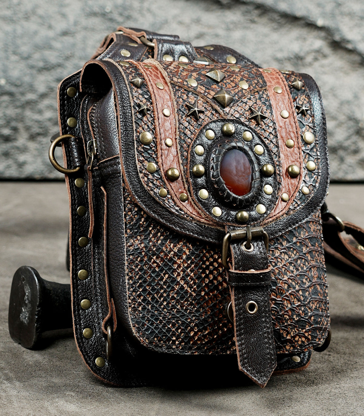 Unisex festival leather harness bag with dual hip pouches and adjustable shoulder straps.