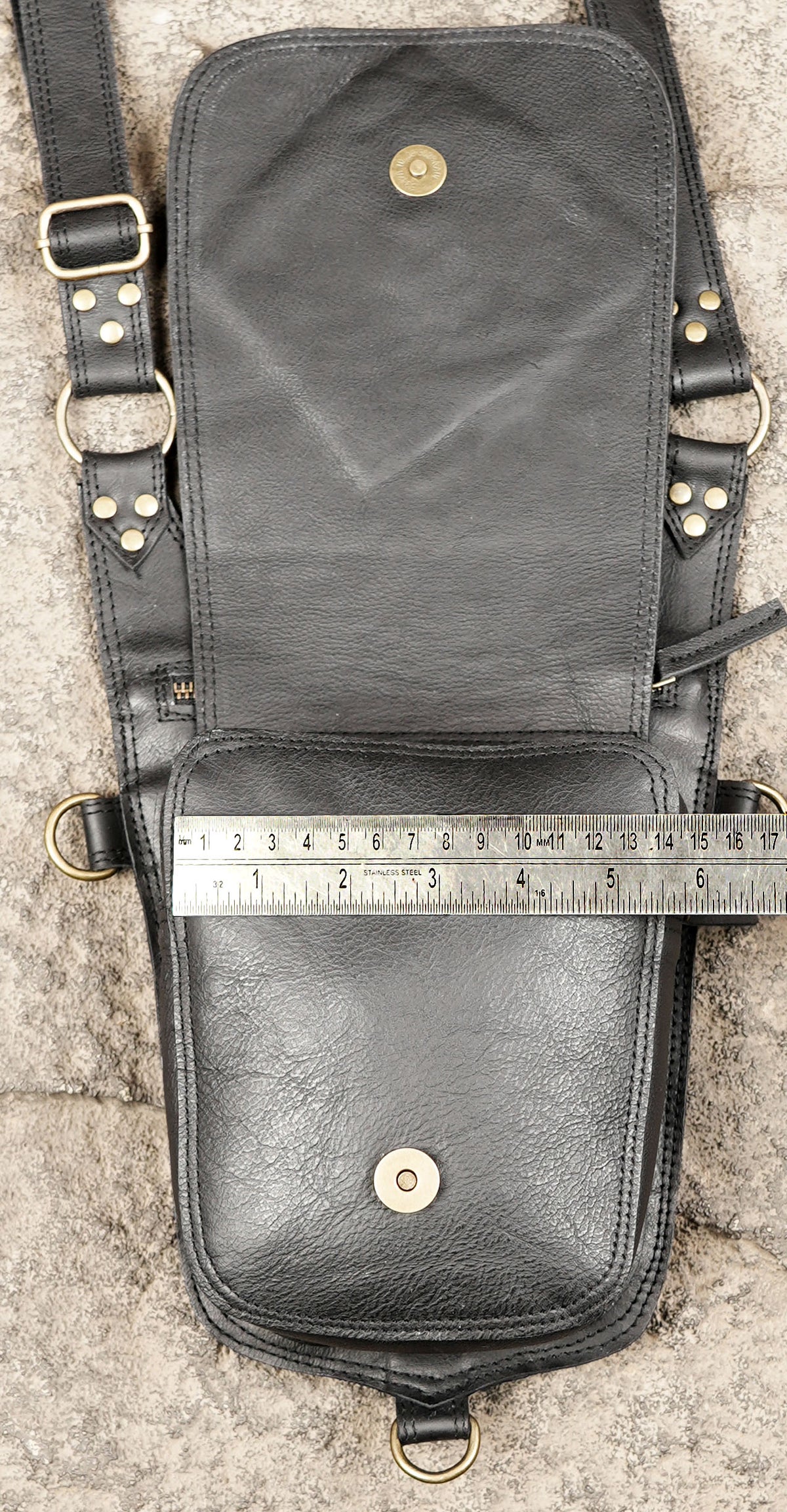 Black leather rave festival chest bag with geometric decoration