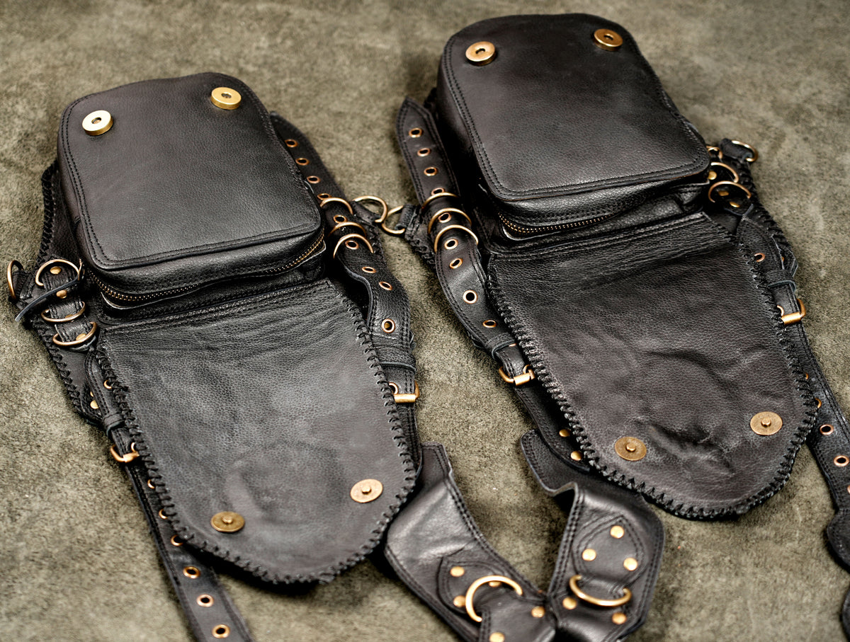Tactical leather holster with multiple gemstones and brass clips