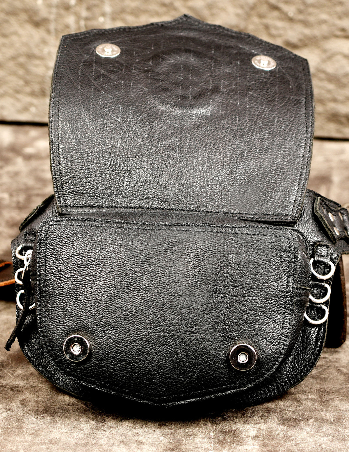 Tan trimmed leather belt with chain and stone detail