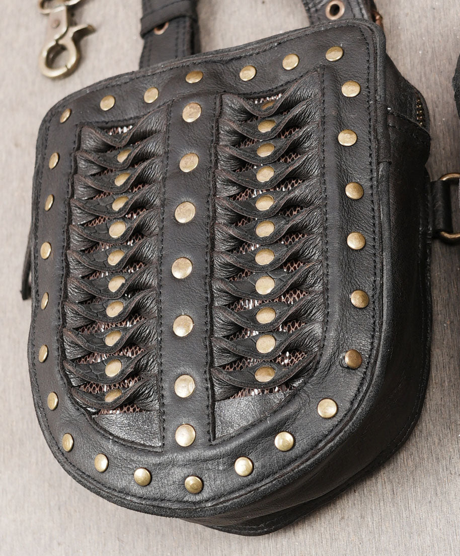 Alternative fashion thigh holster harness with black leather and brass hardware