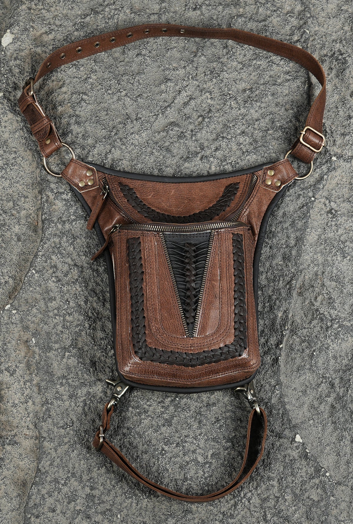 Unisex leather utility bag with metal rivets
