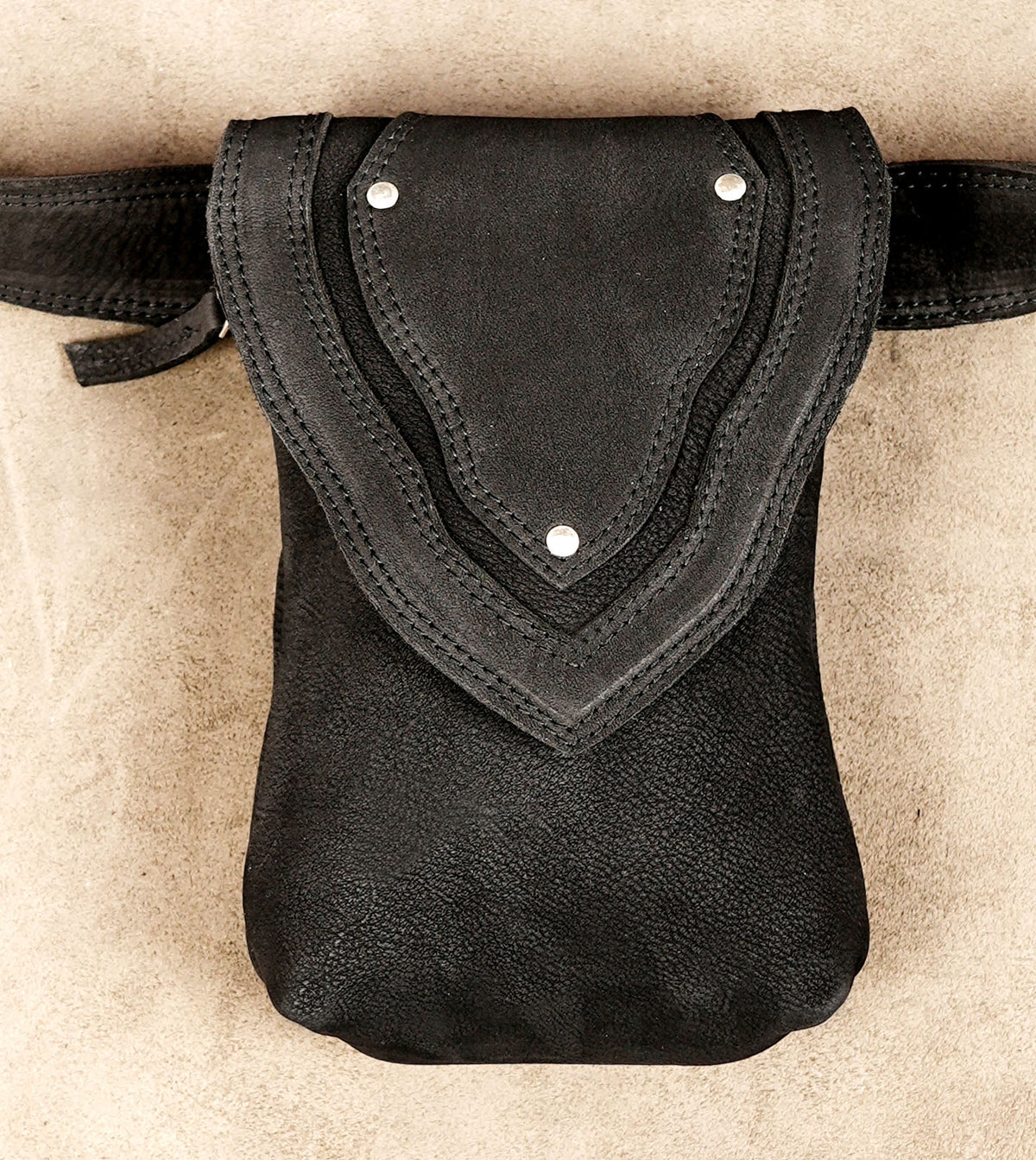 Vertical leather hip bag, minimalist front angle shot