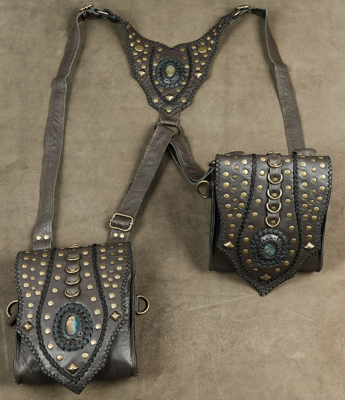 Warrior class leather accessory with studded panels
