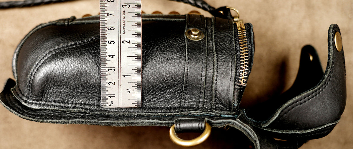 Western leather holster bag with braided stitch detail
