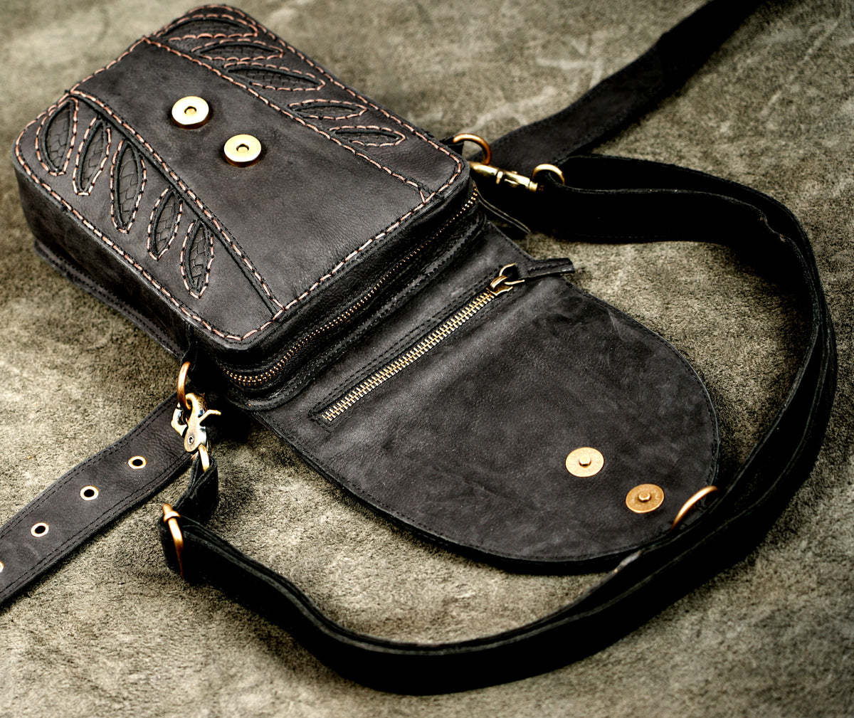 Artisan leather waist bag with brass pyramid studs and gemstone embellishment