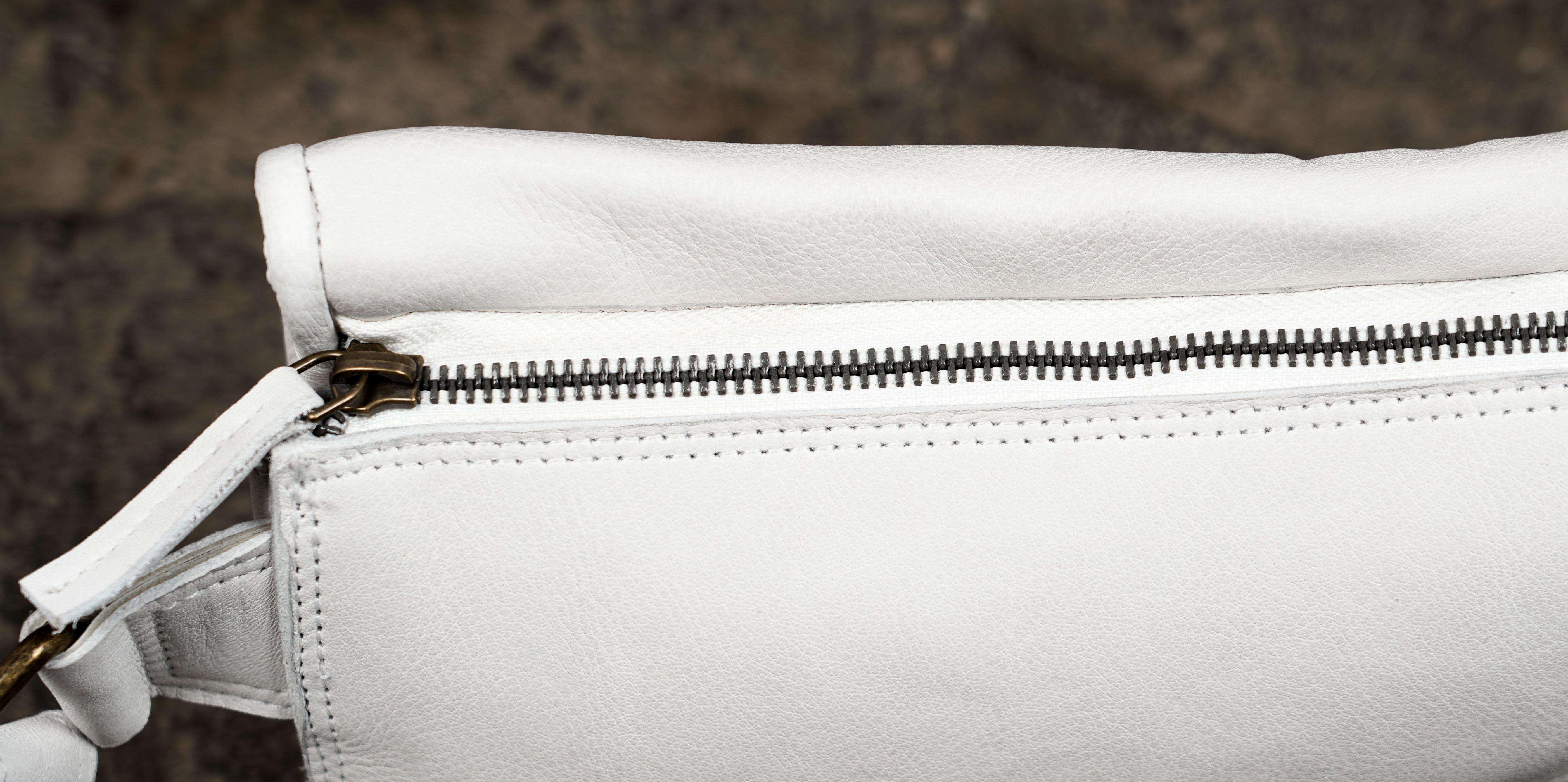 White leather festival bag with labradorite gem and zip pocket