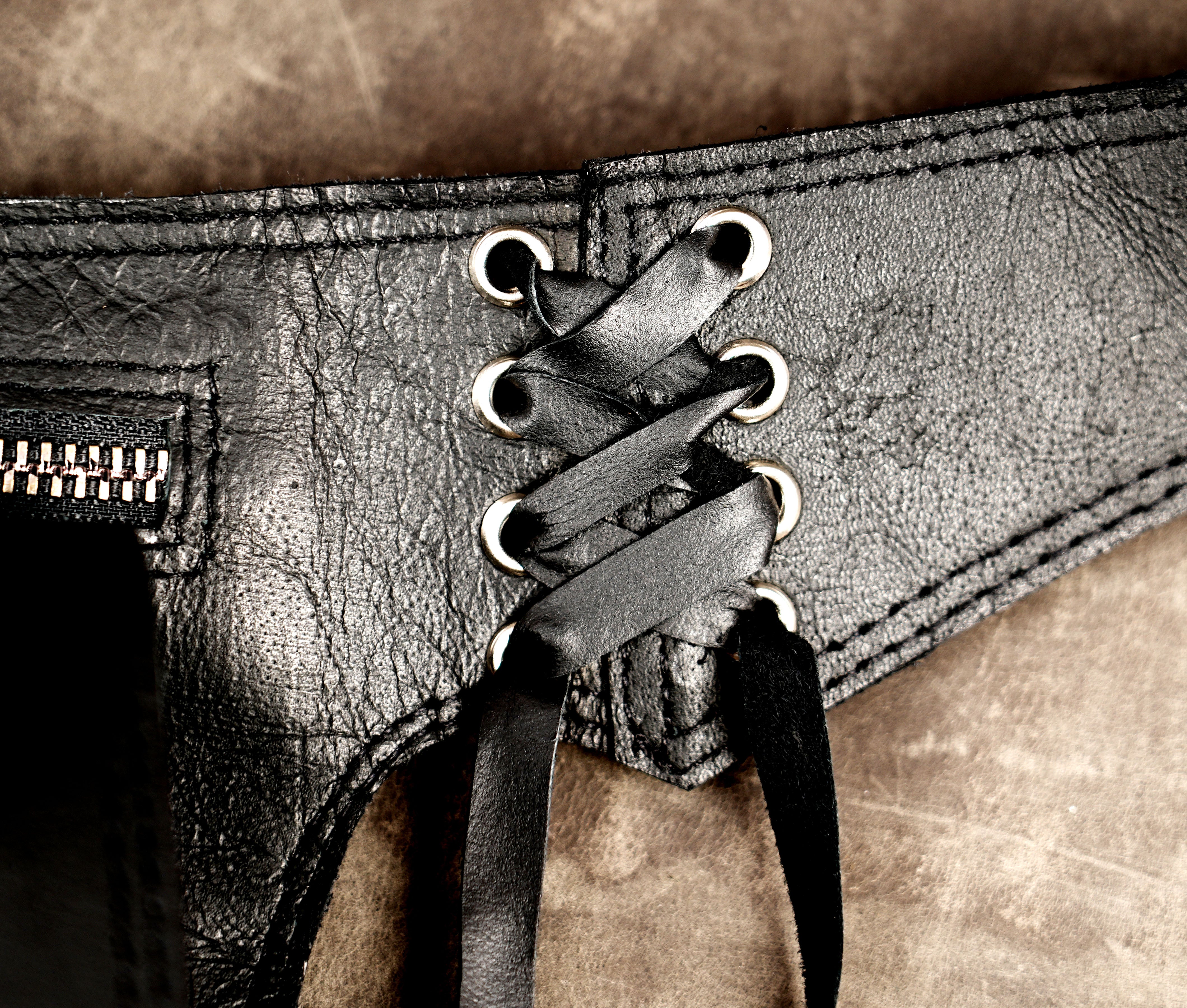 Handmade leather medicine bag with fringe and natural stone