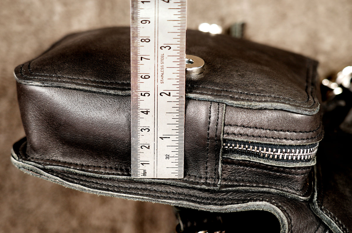 Handcrafted leather waist bag with adjustable long strap