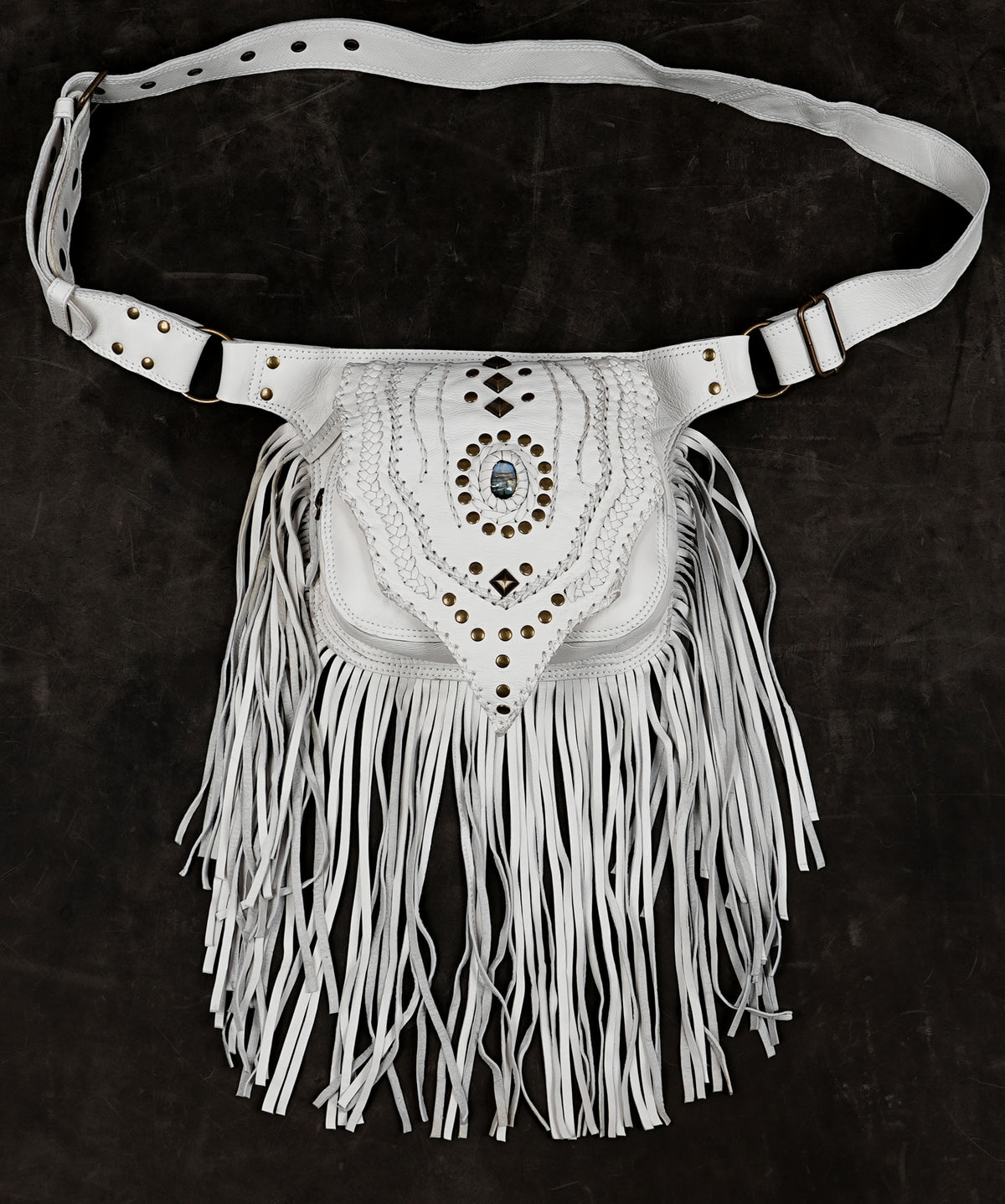 White leather fringe belt bag with decorative studs and long tassels