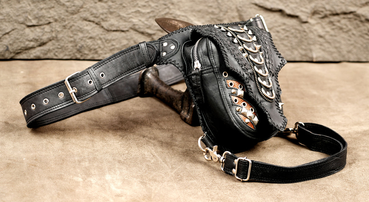 Biker style leather thigh pouch with a zipper side pocket