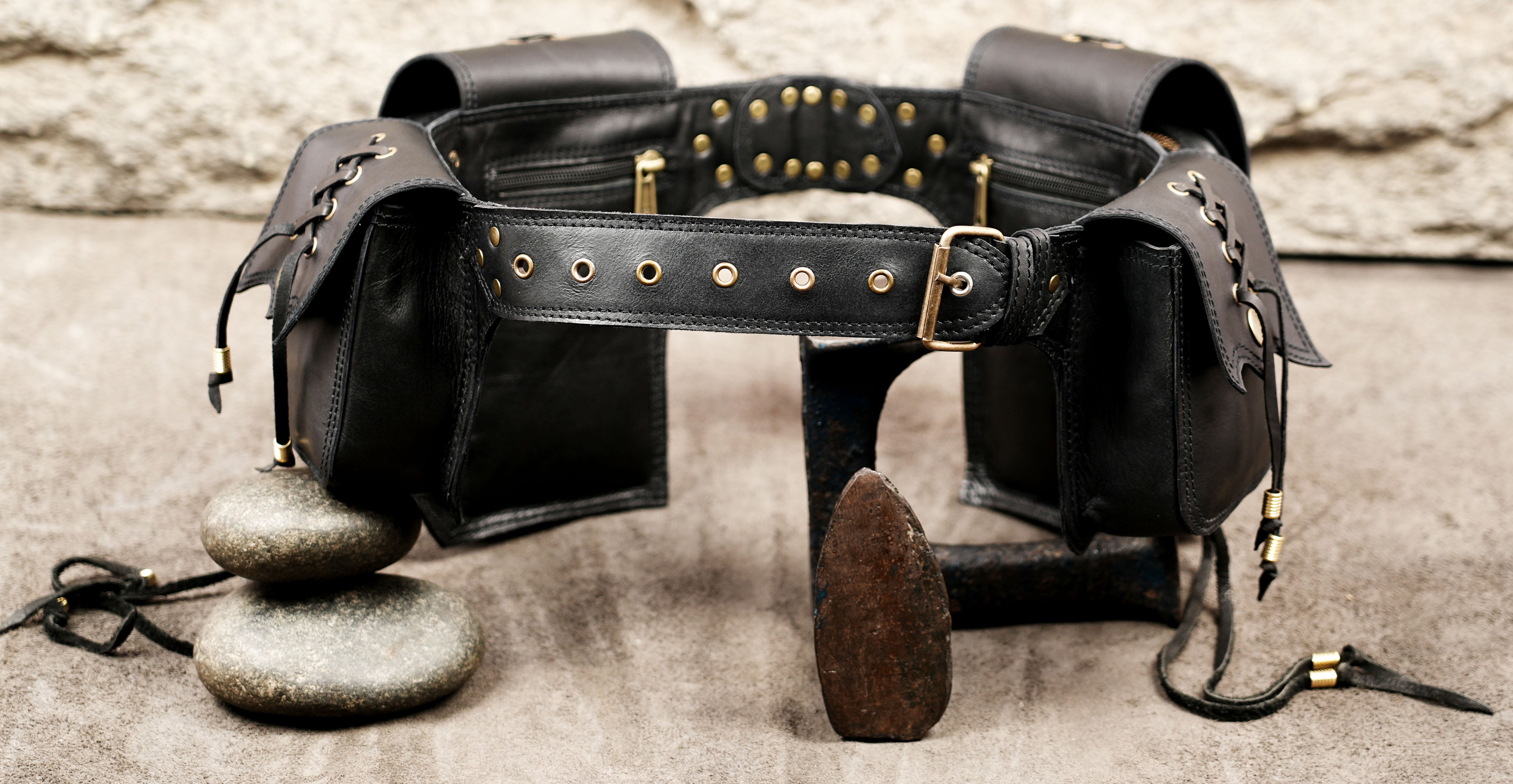 Adjustable leather waist belt with multiple pouches