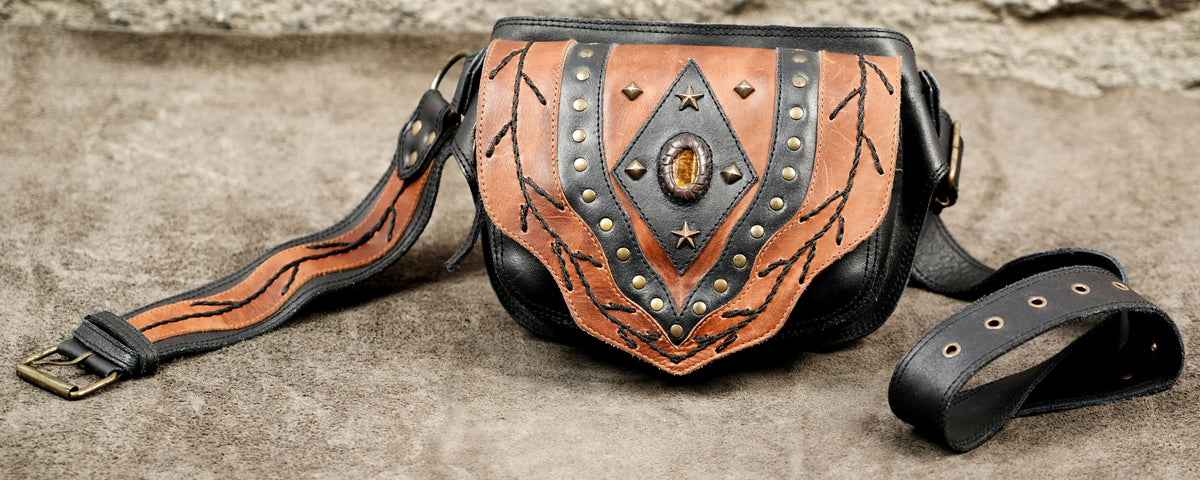 Adjustable leather waist bag with antique brass hardware