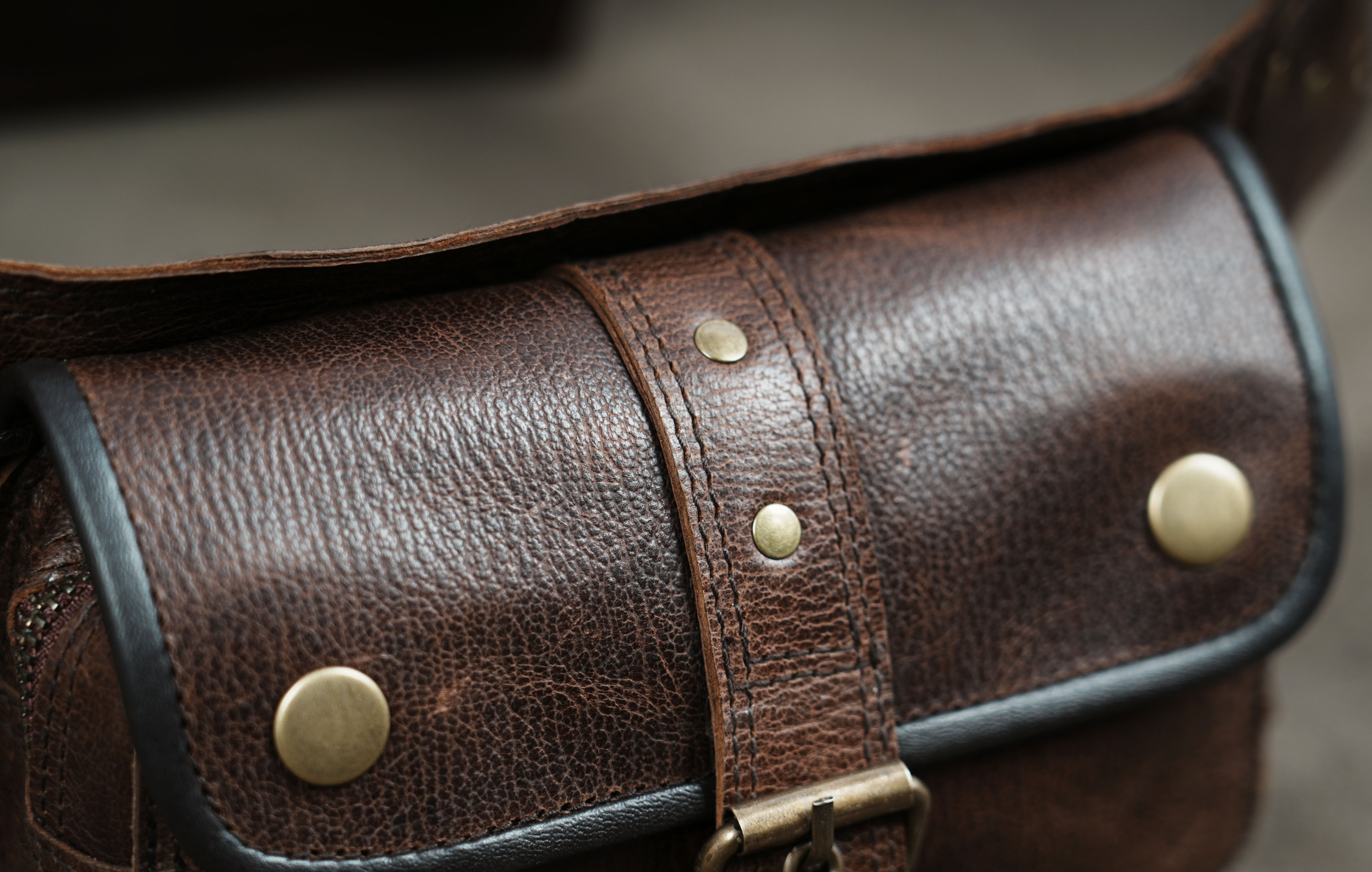 Handmade leather belt bag with two pockets and antique brass fittings