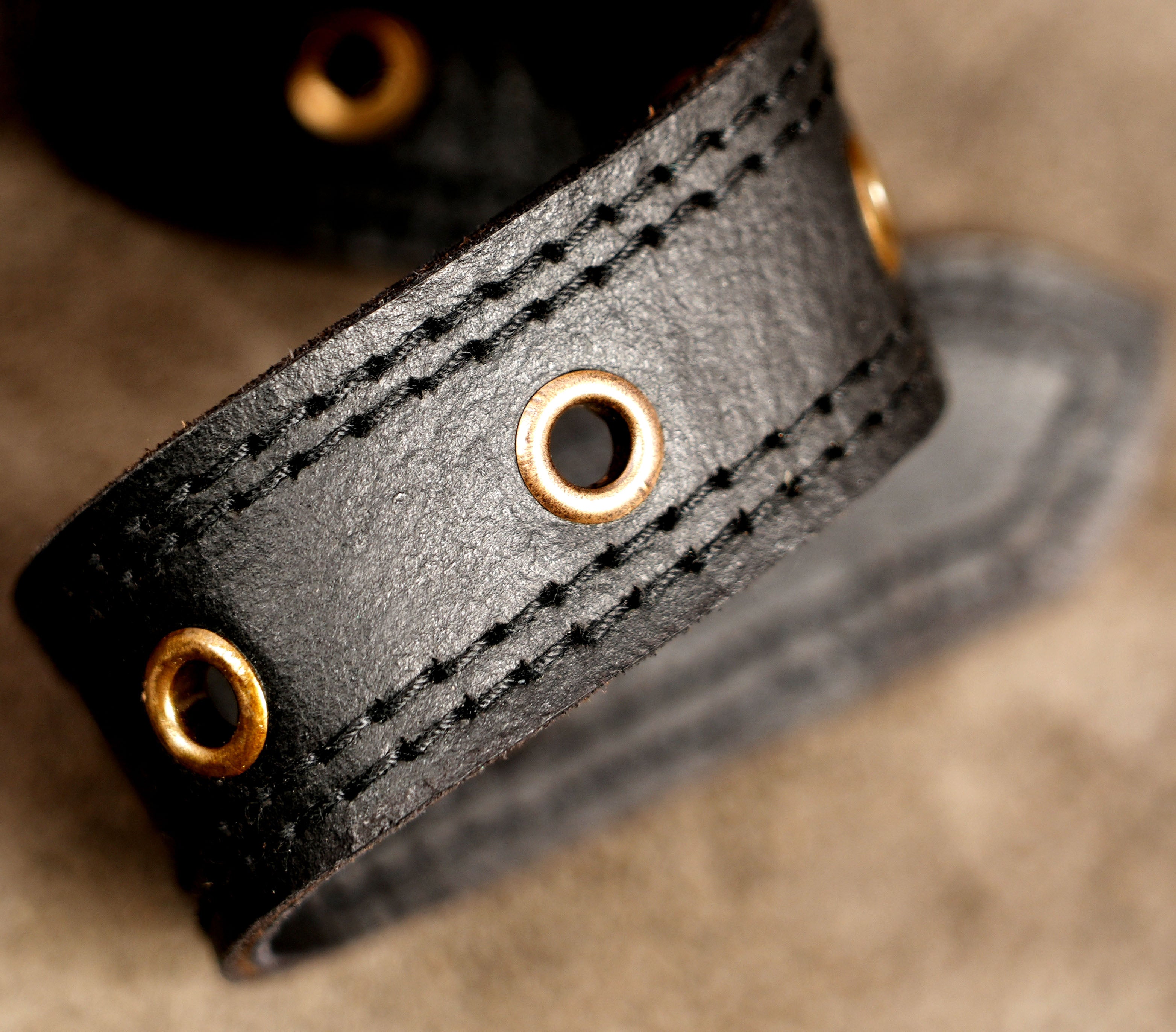 Genuine leather belt bag with decorative brass studs and gemstone