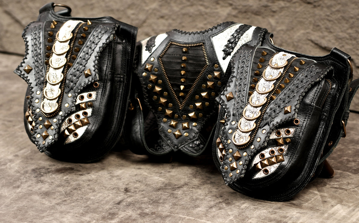 Handcrafted leather underarm holster bag with metal hardware accents