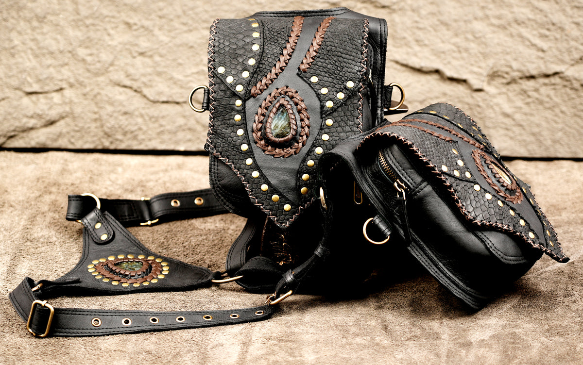 Unisex black leather shoulder holster with antique brass buckles