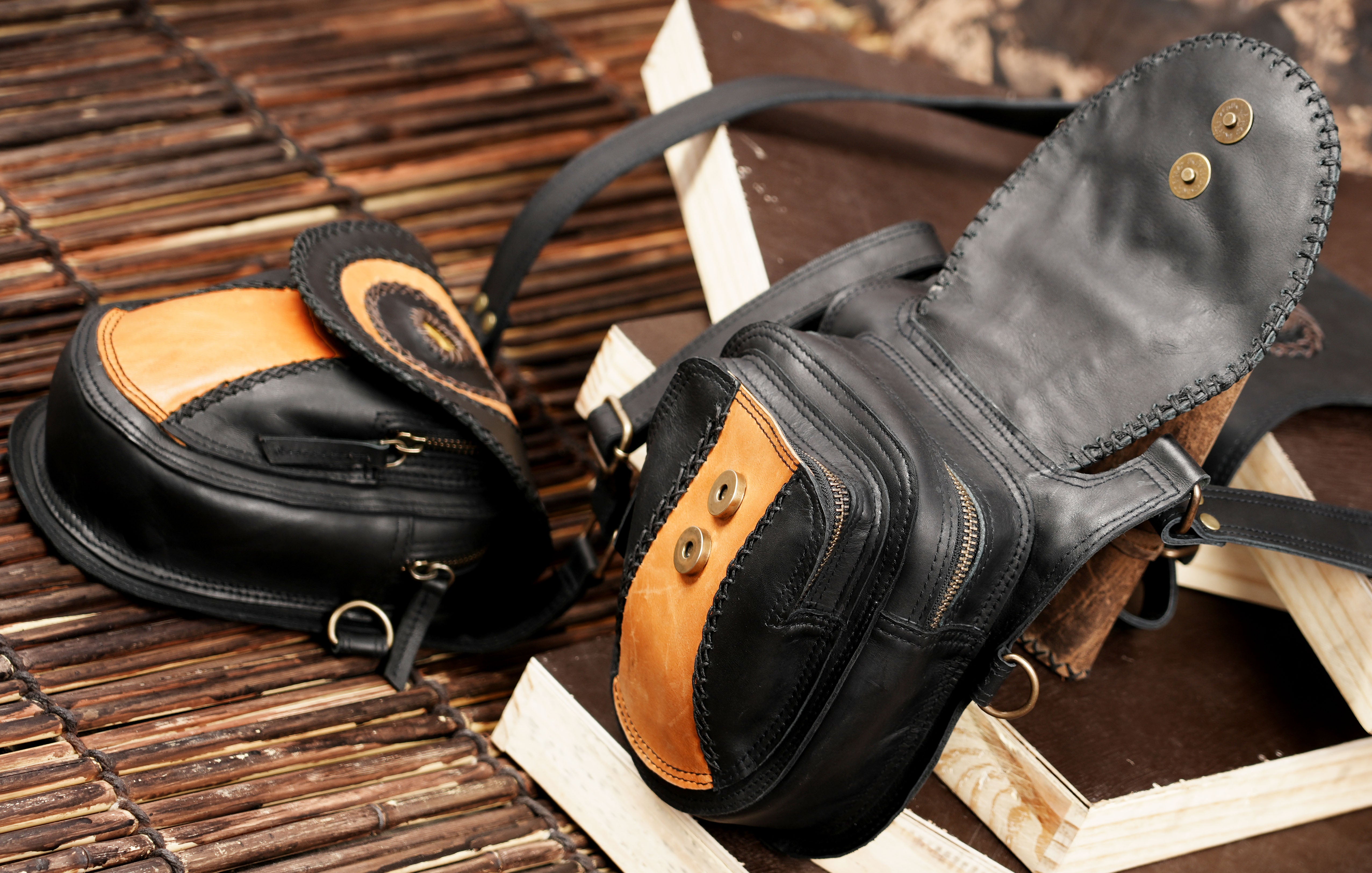 Leather crossbody harness bag with zipper pockets