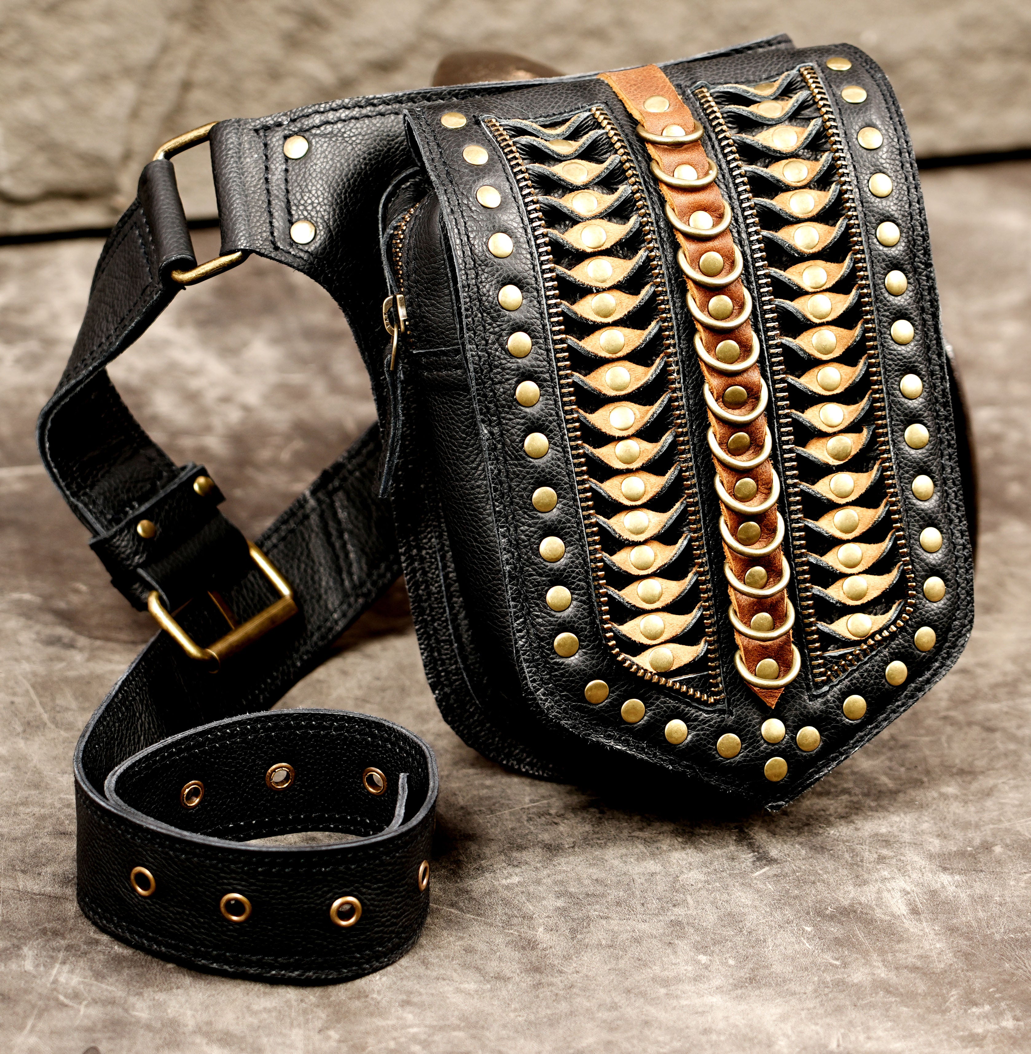 Black leather body belt with adjustable buckle straps