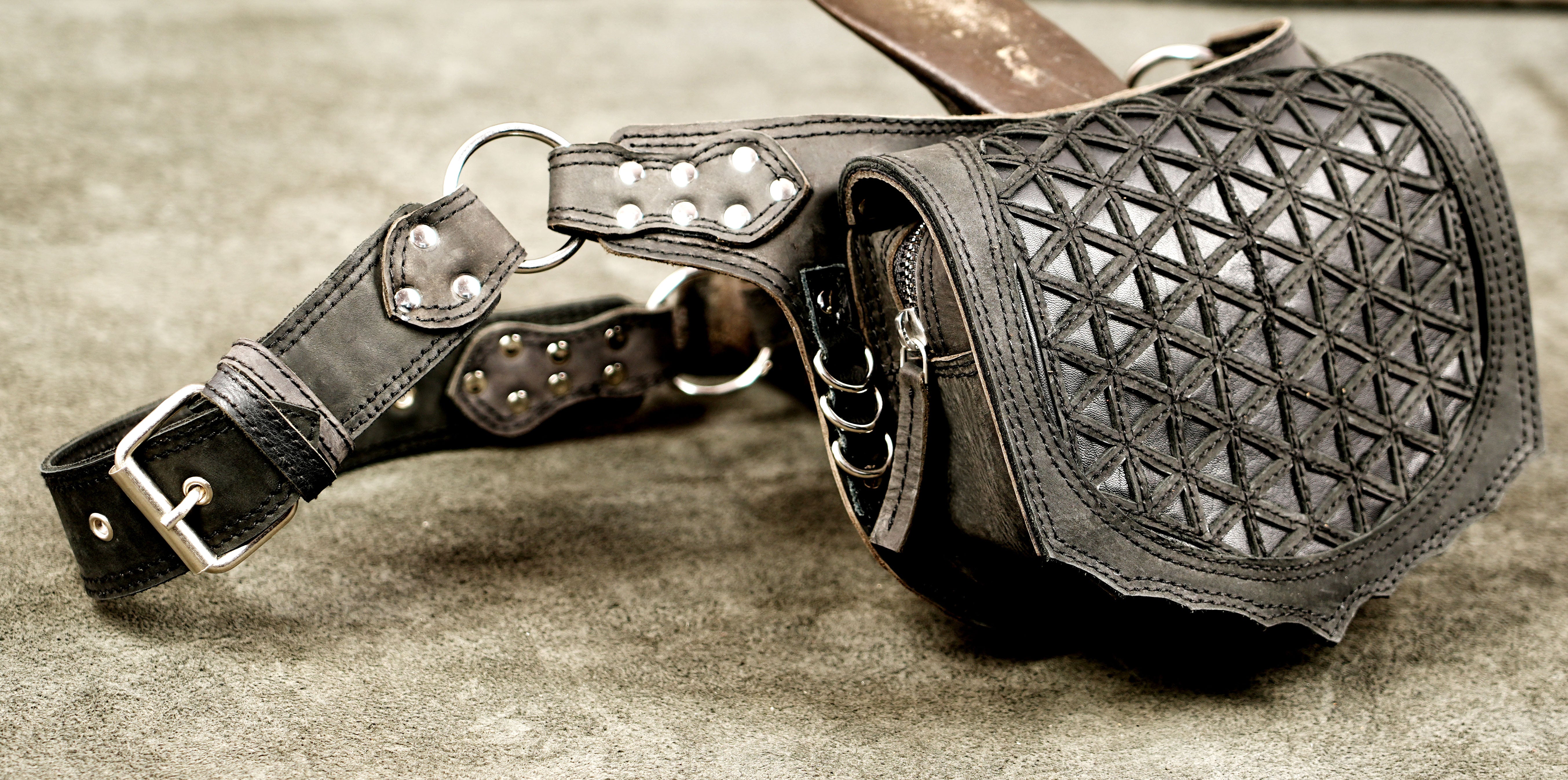 Leather fanny pack with sacred geometric artwork and durable silver hardware