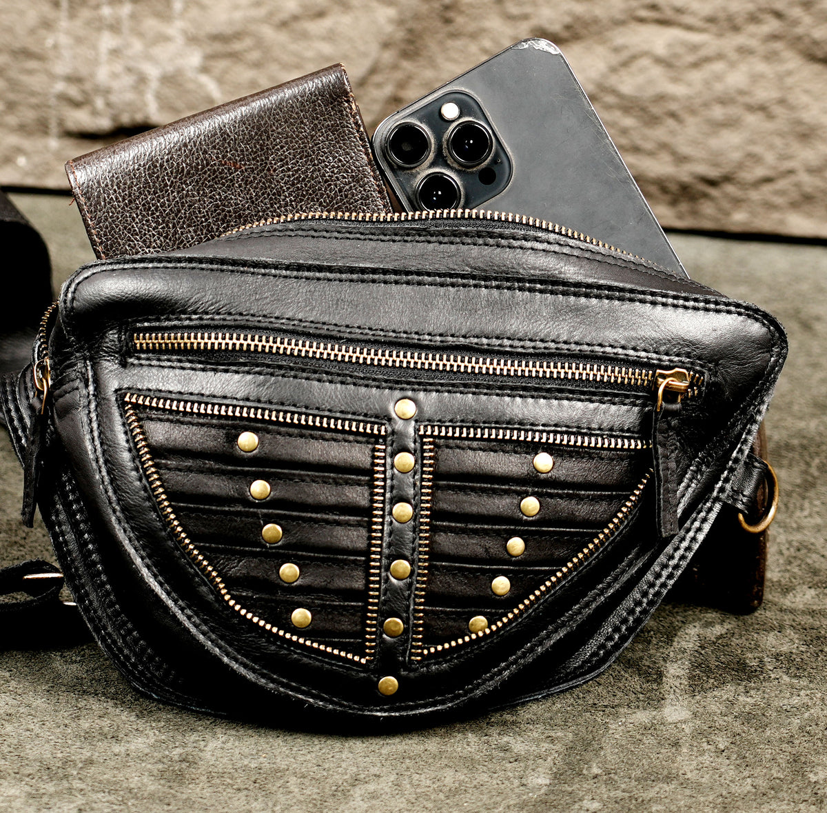 Handmade unisex leather chest pack with studded detailing