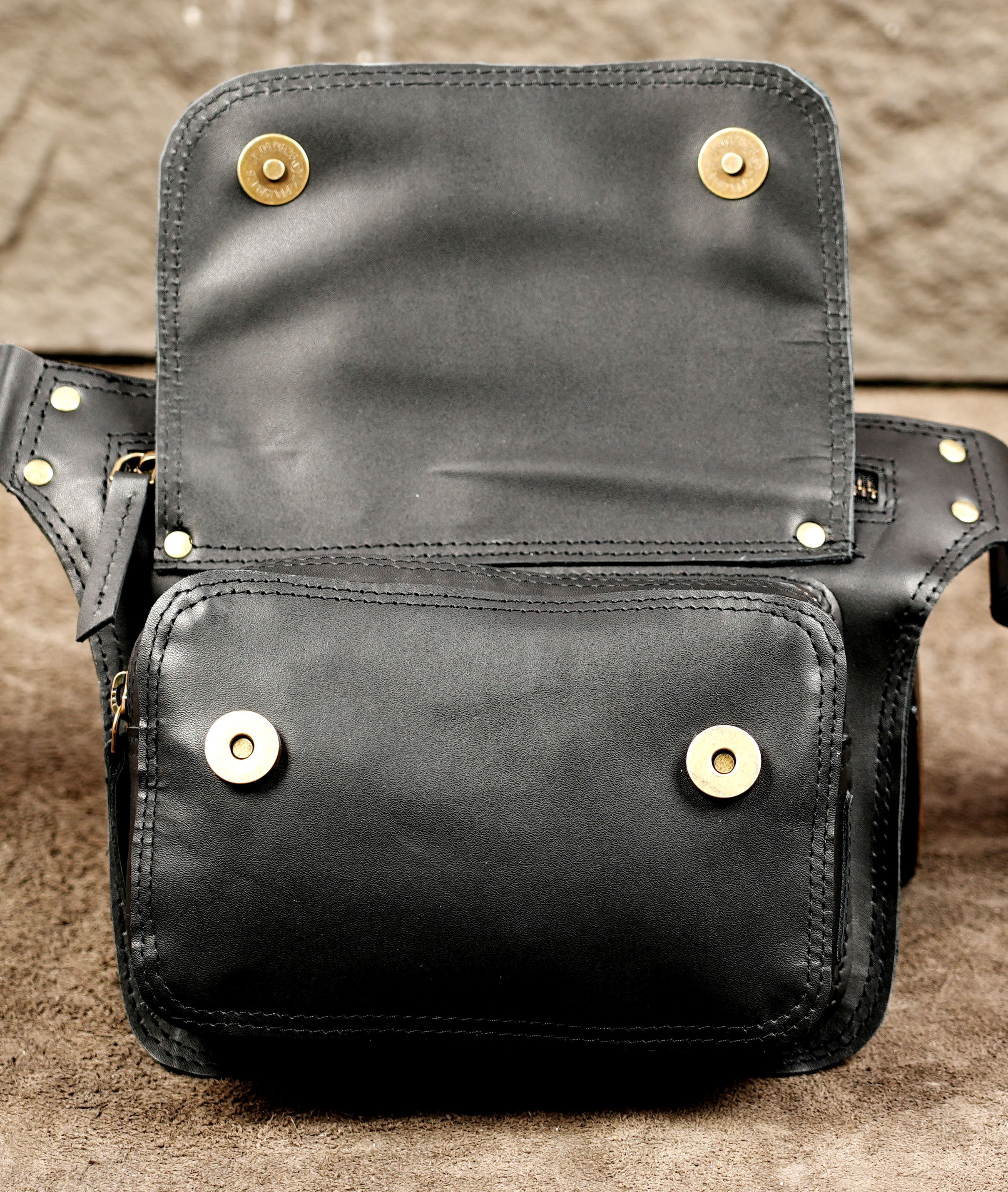 Handmade leather waist pouch with practical storage compartments