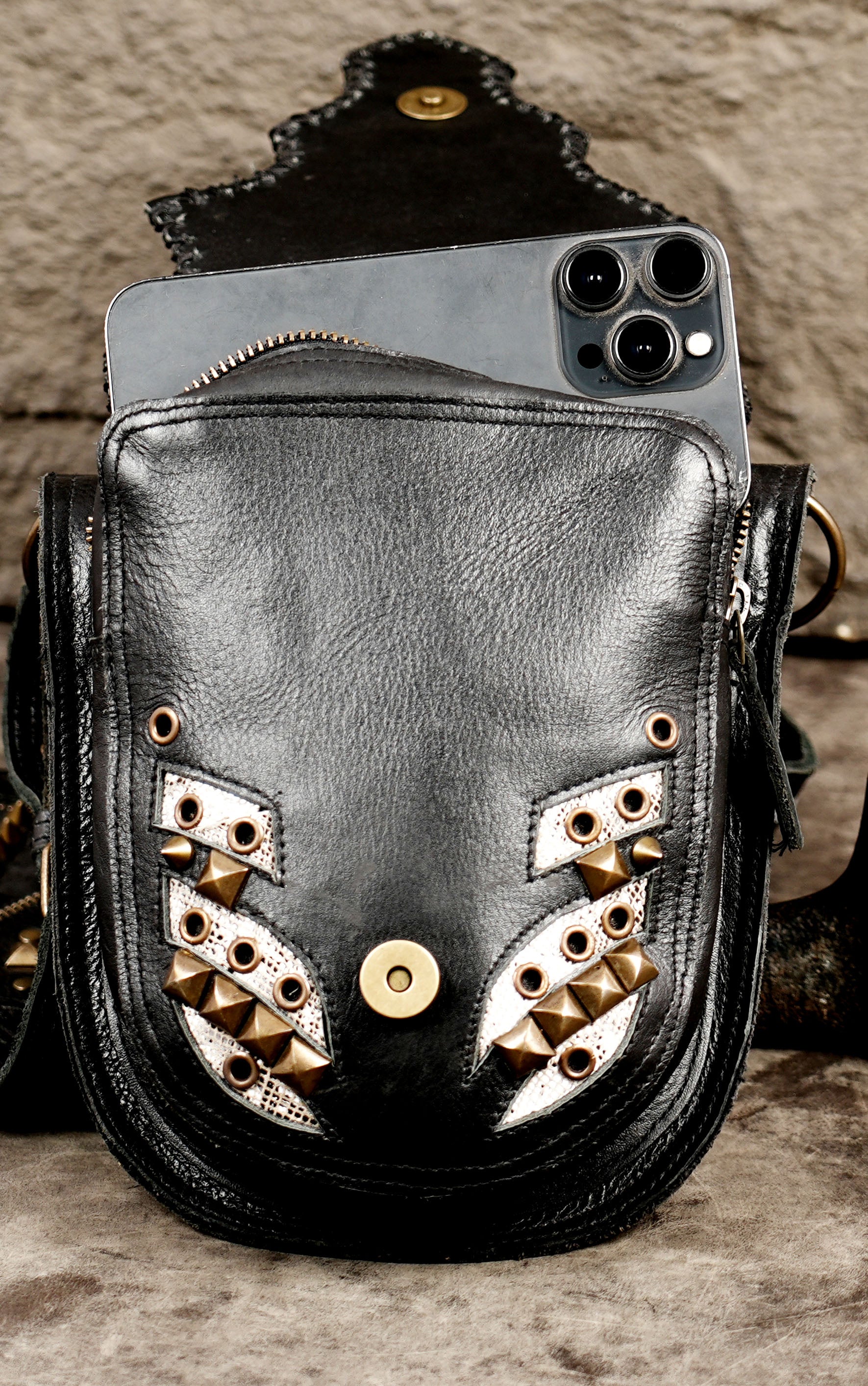 Heavy-duty leather shoulder holster bag with Brass stud details