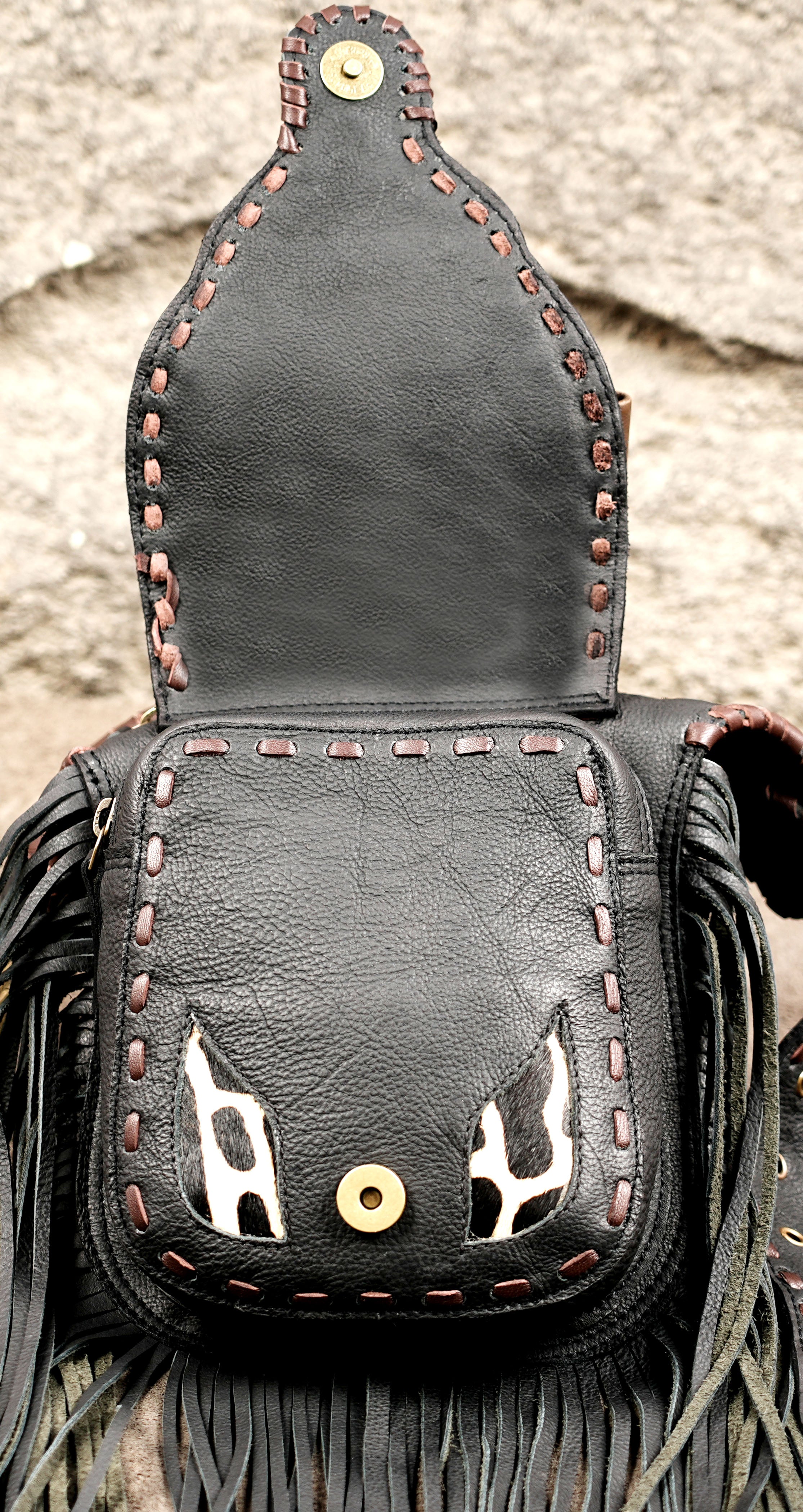 Black Leather Fringe Waist Belt Bag with Cow Print Detail and Antique Brass Hardware