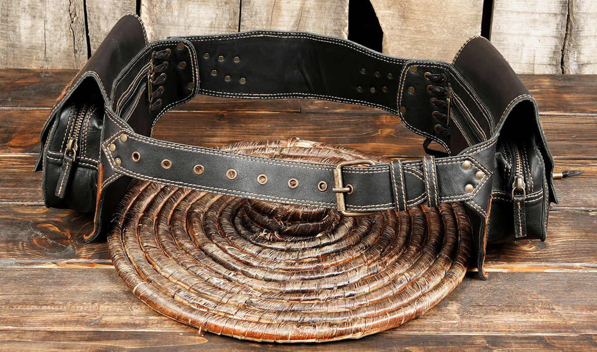 Black leather festival belt with side pouches and brown embossed leather decoration