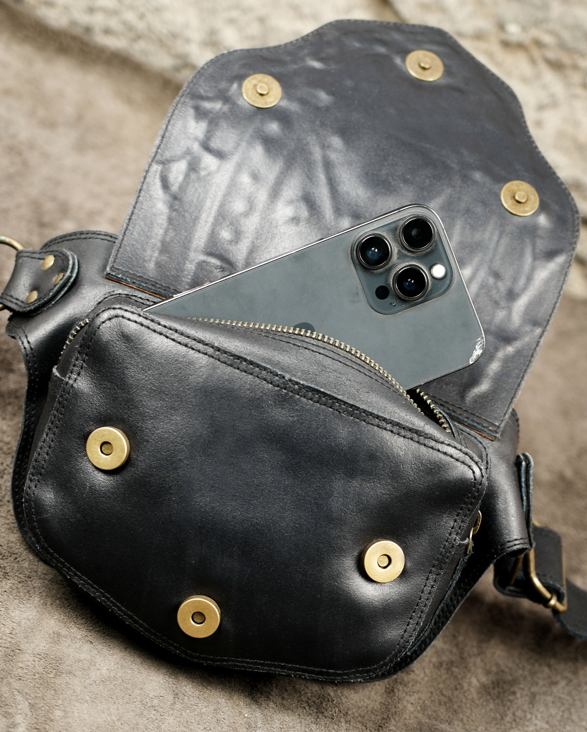 Rustic leather belt bag featuring tiger eye gemstone