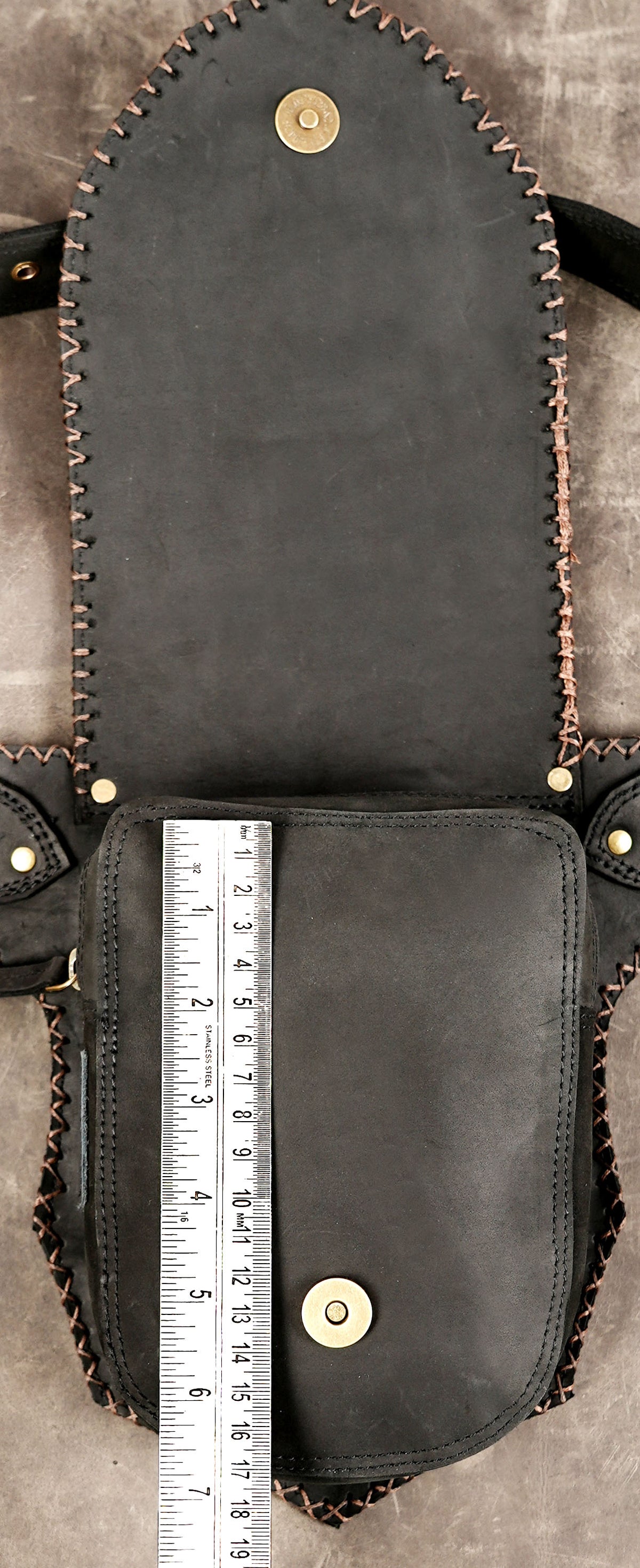Handmade rustic leather hip belt with detailed stitching