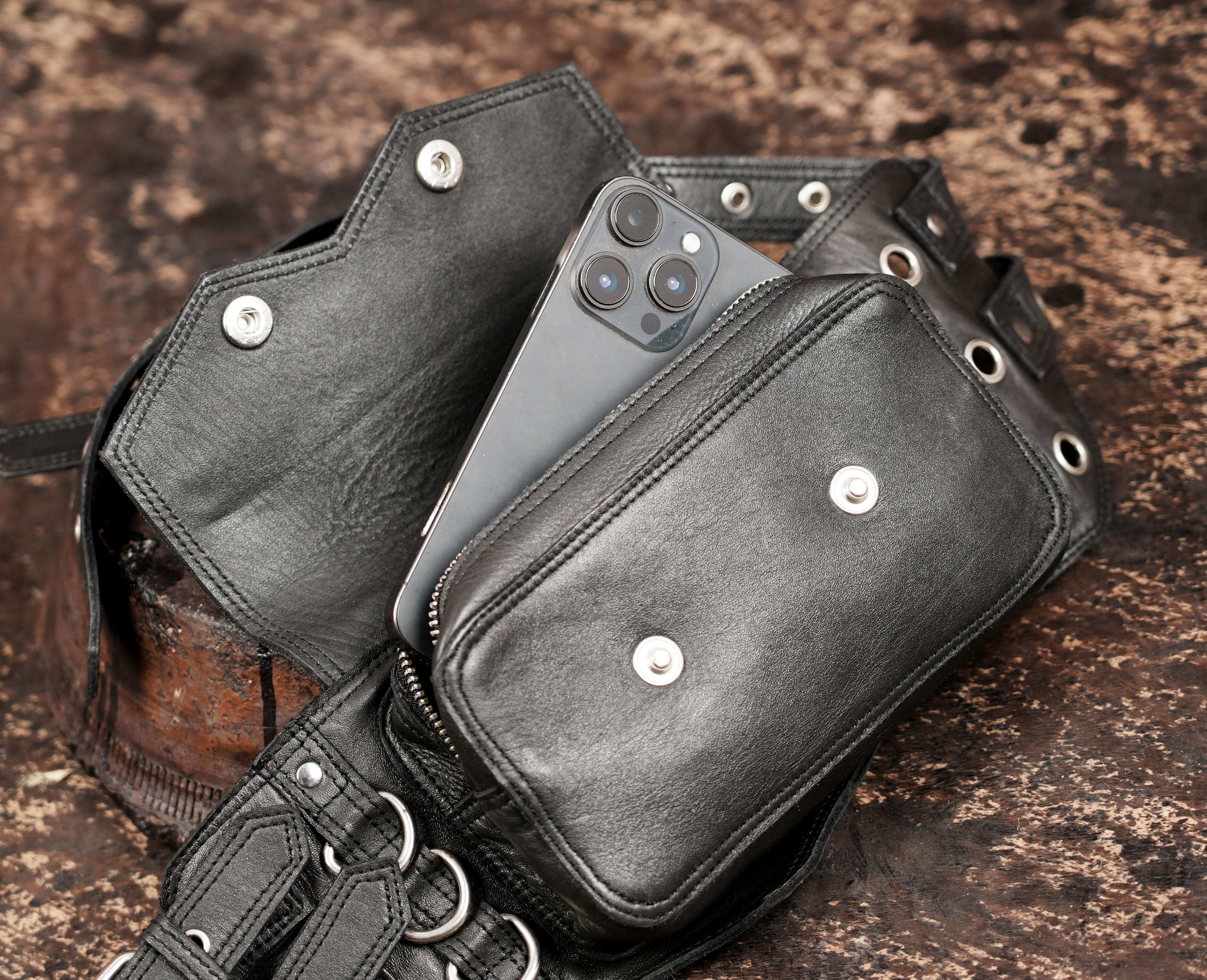 leather belt with snap pocket design