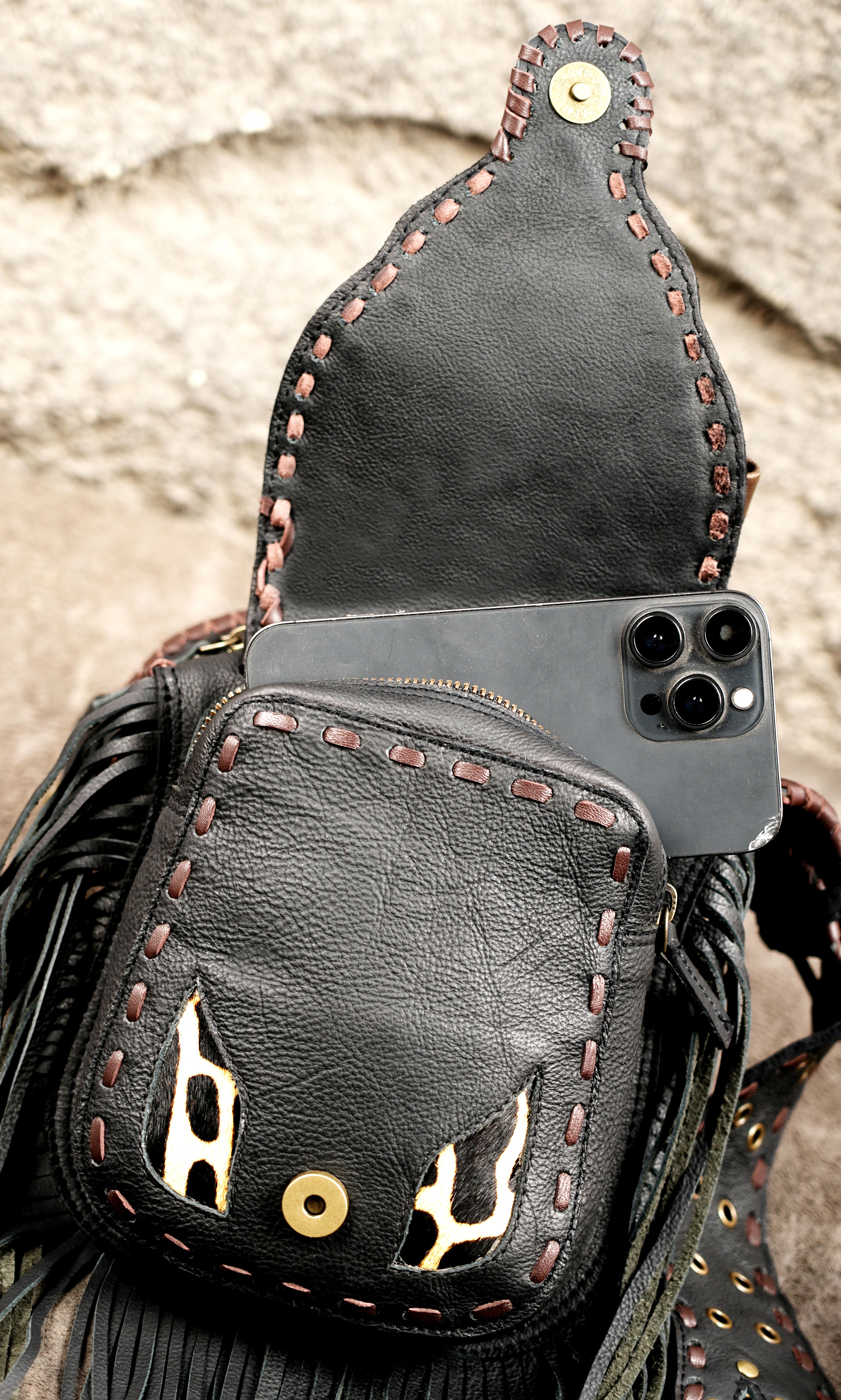 Black Leather Fringe Waist Belt Bag with Cow Print Detail and Antique Brass Hardware