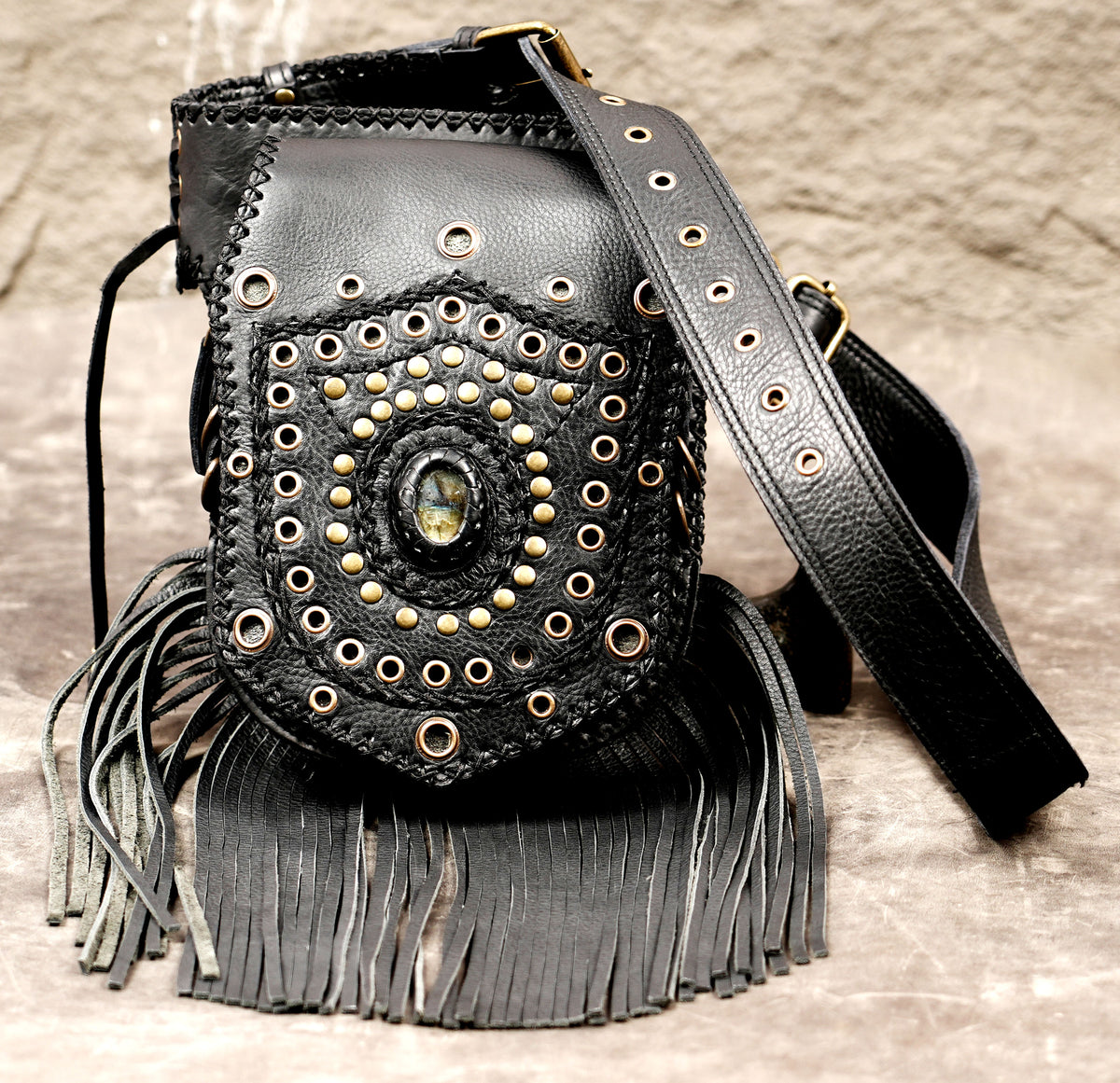 Rustic handmade leather waist pouch with fringe