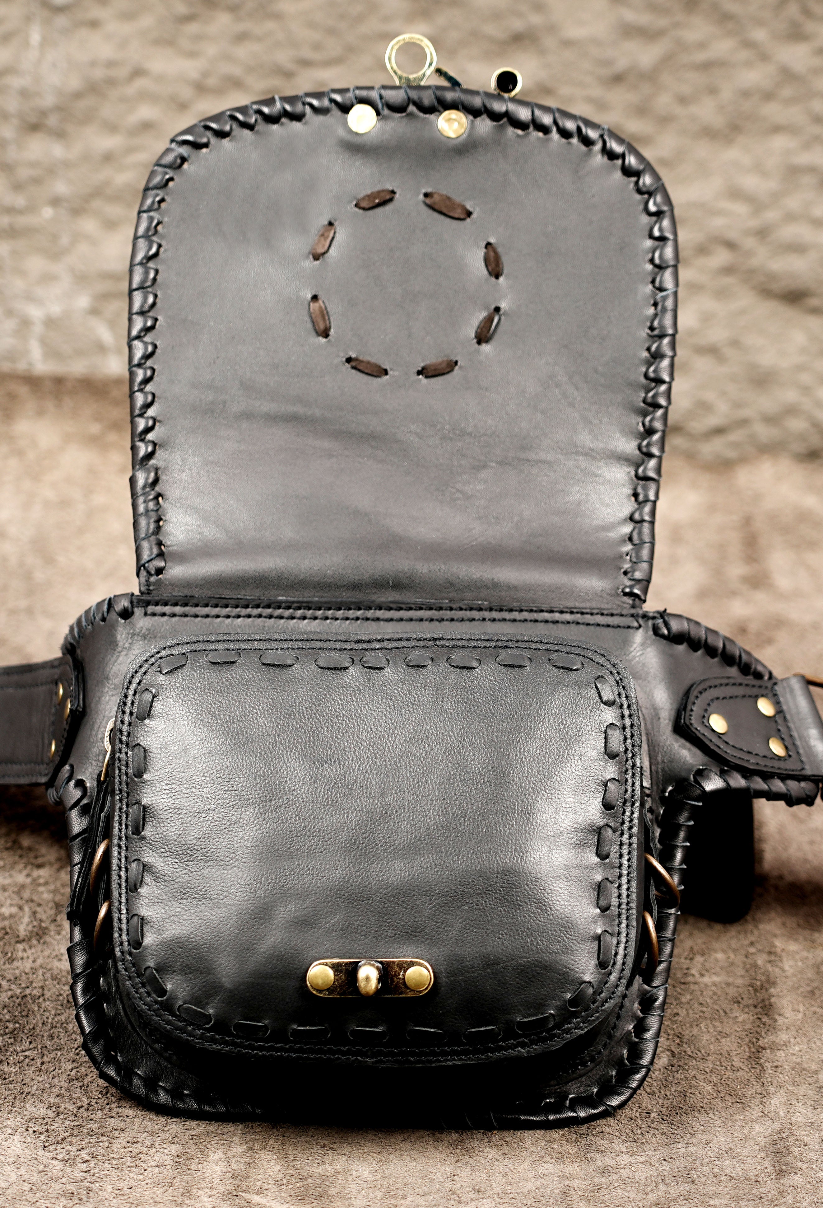 Adjustable black leather hip pouch