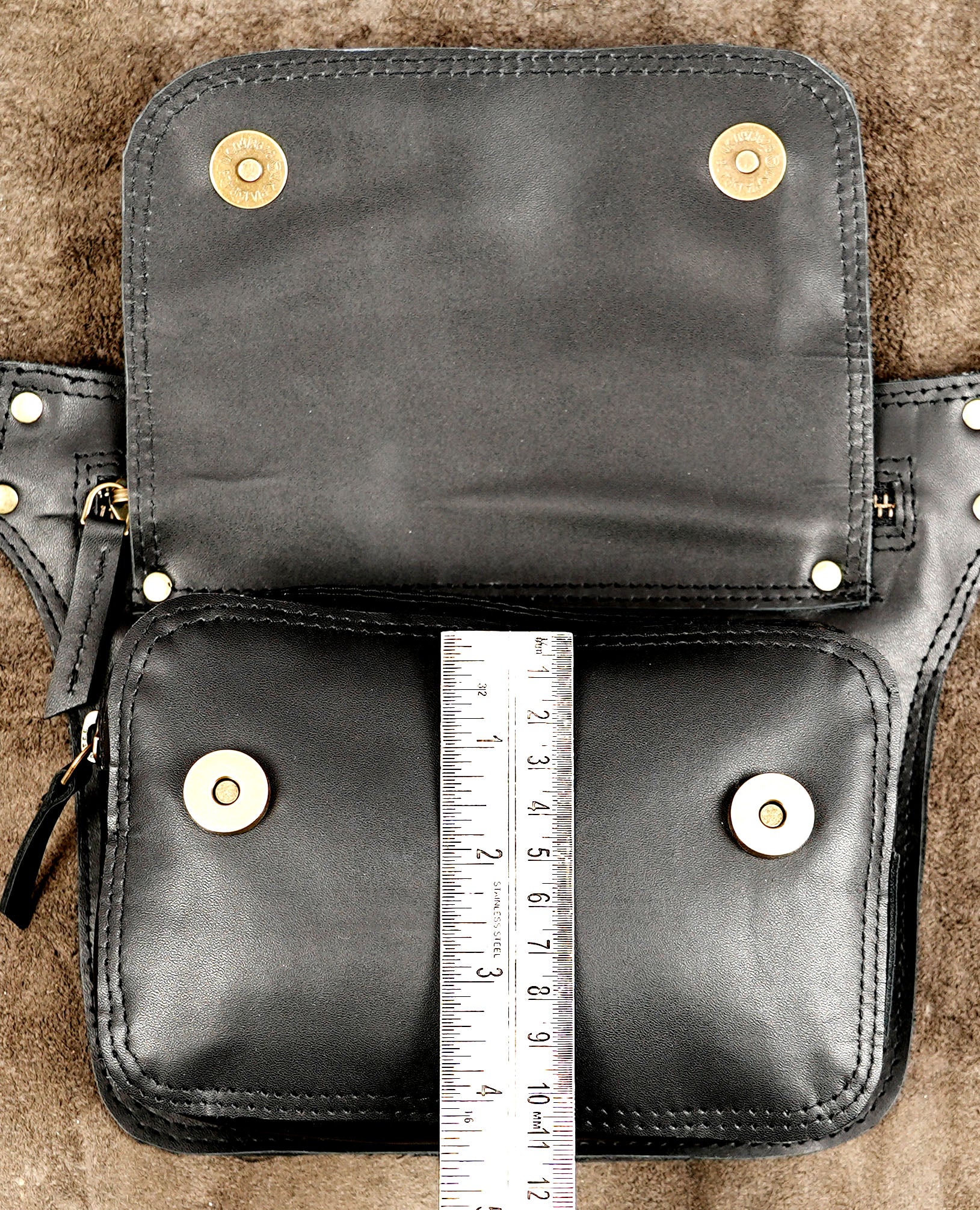 Unisex black leather belt bag with adjustable waist strap