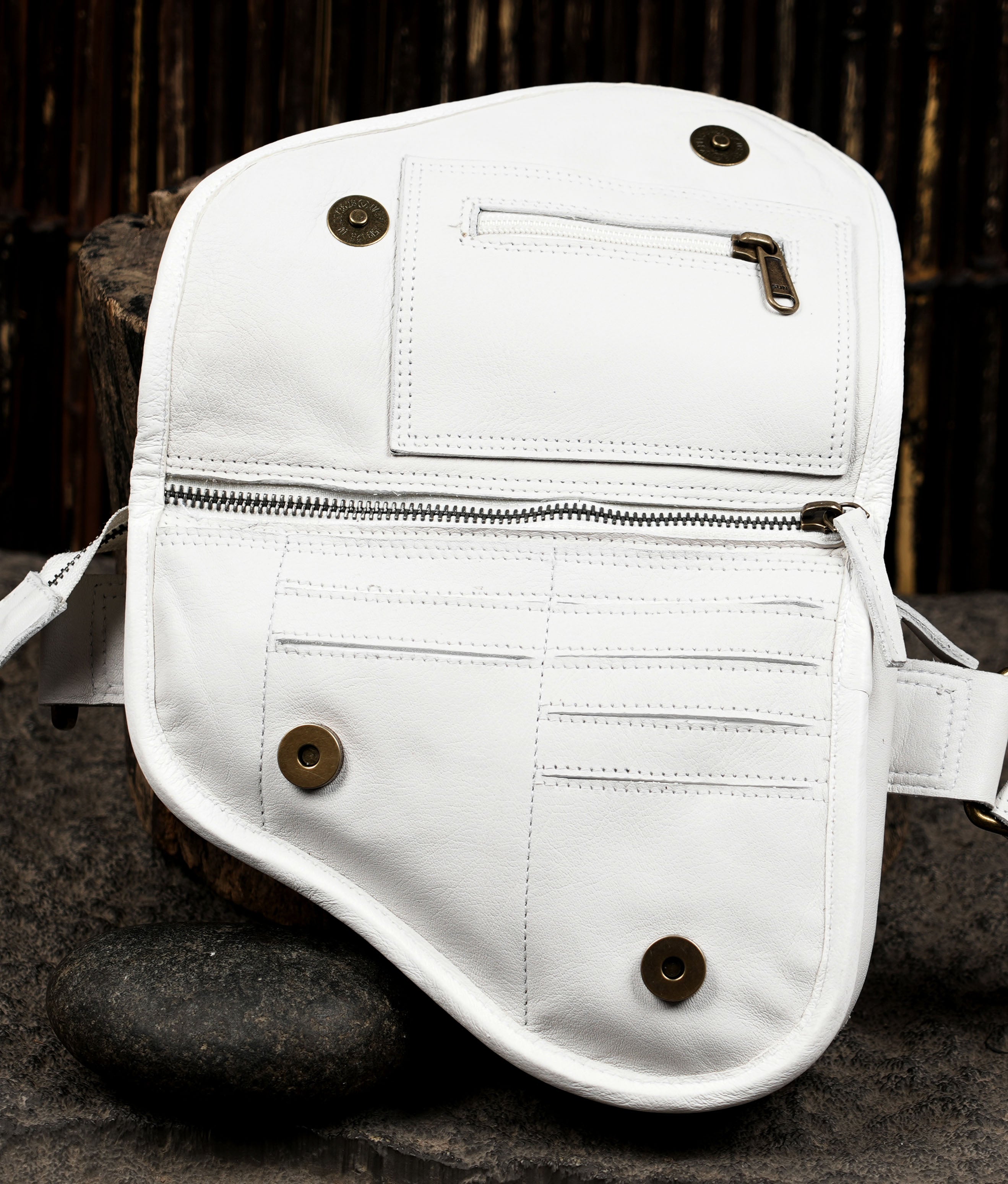 Boho white leather belt bag styled for festivals and travel