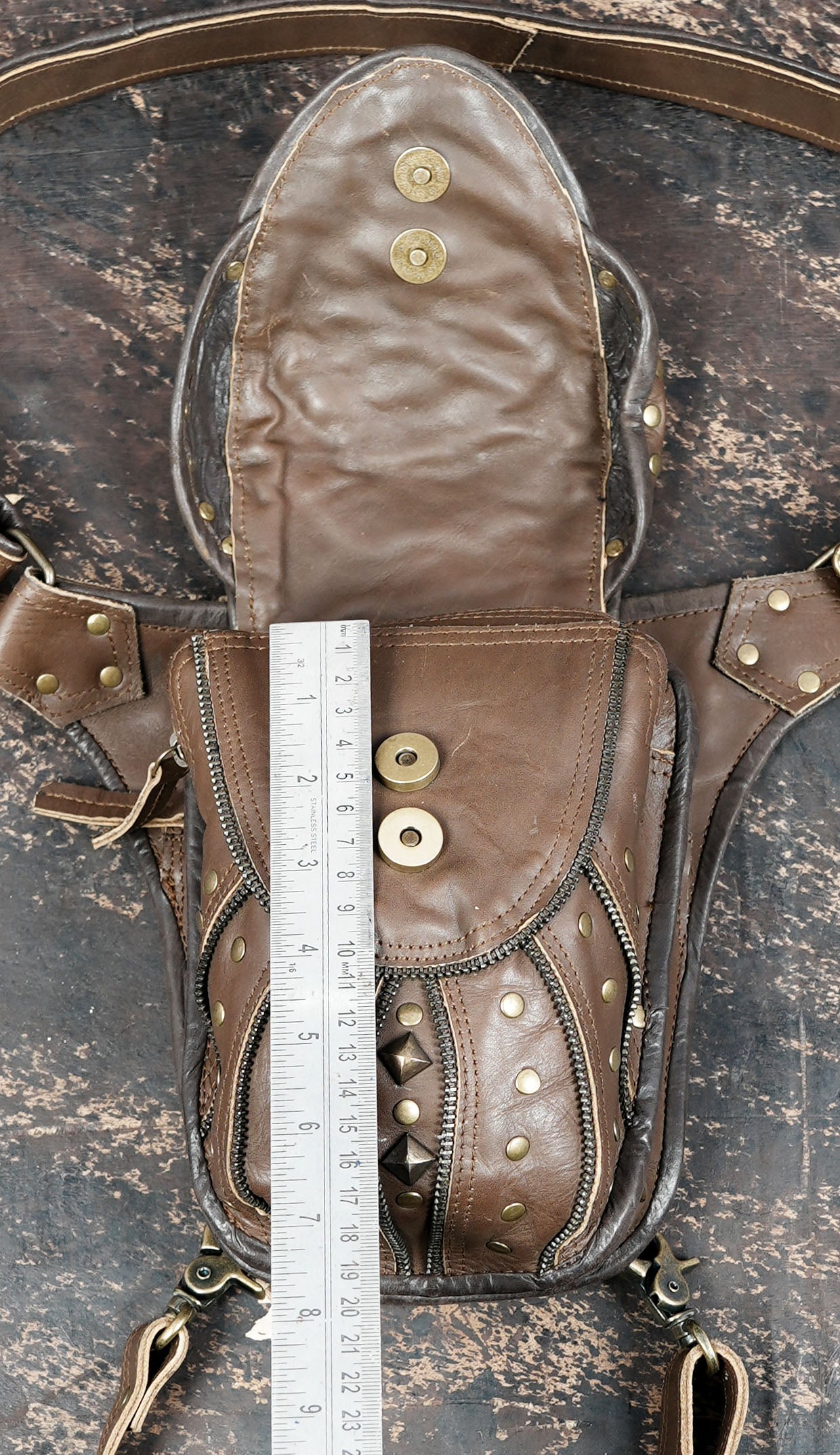 Leather waist belt with attached thigh strap