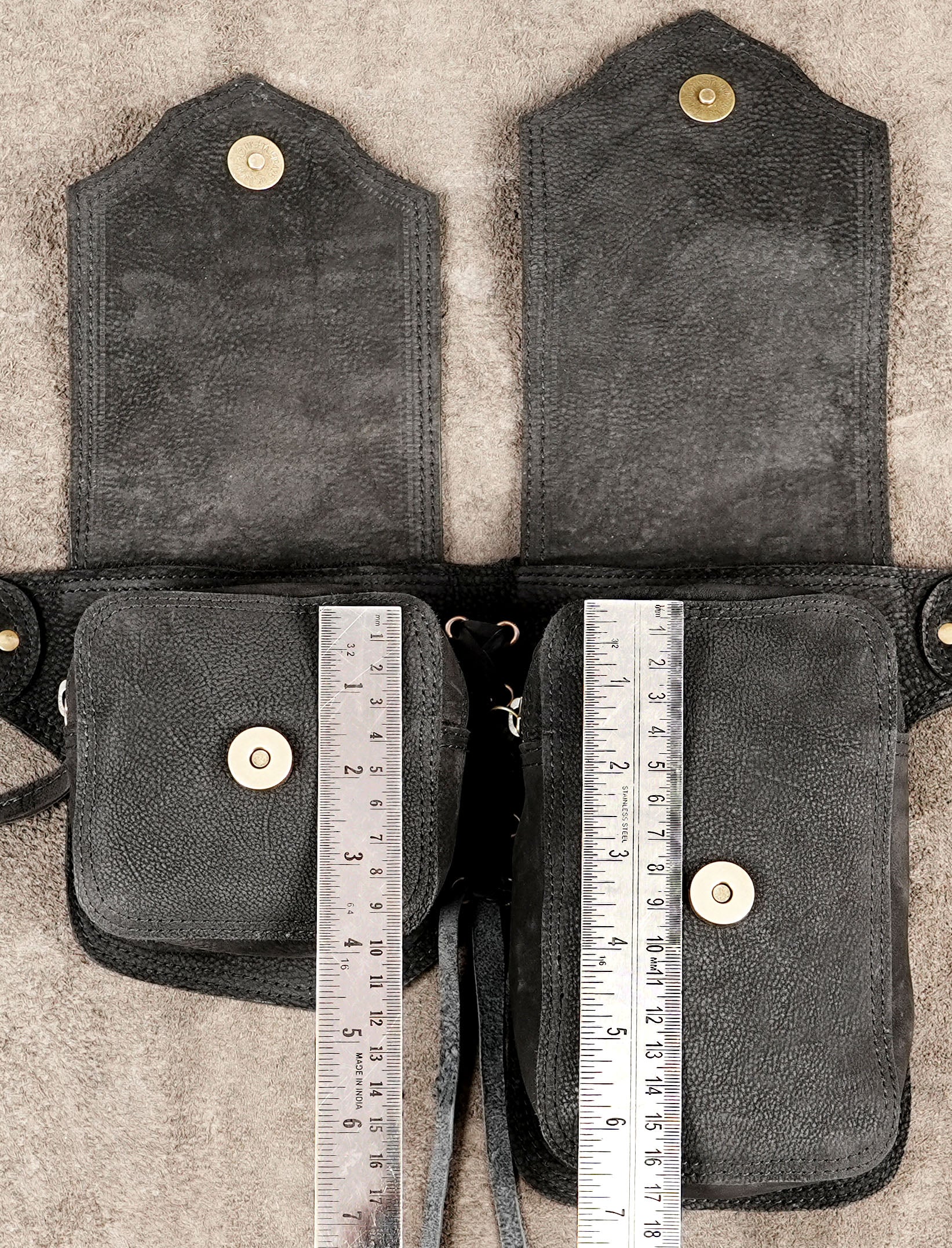 Black leather adventure belt with storage pouches