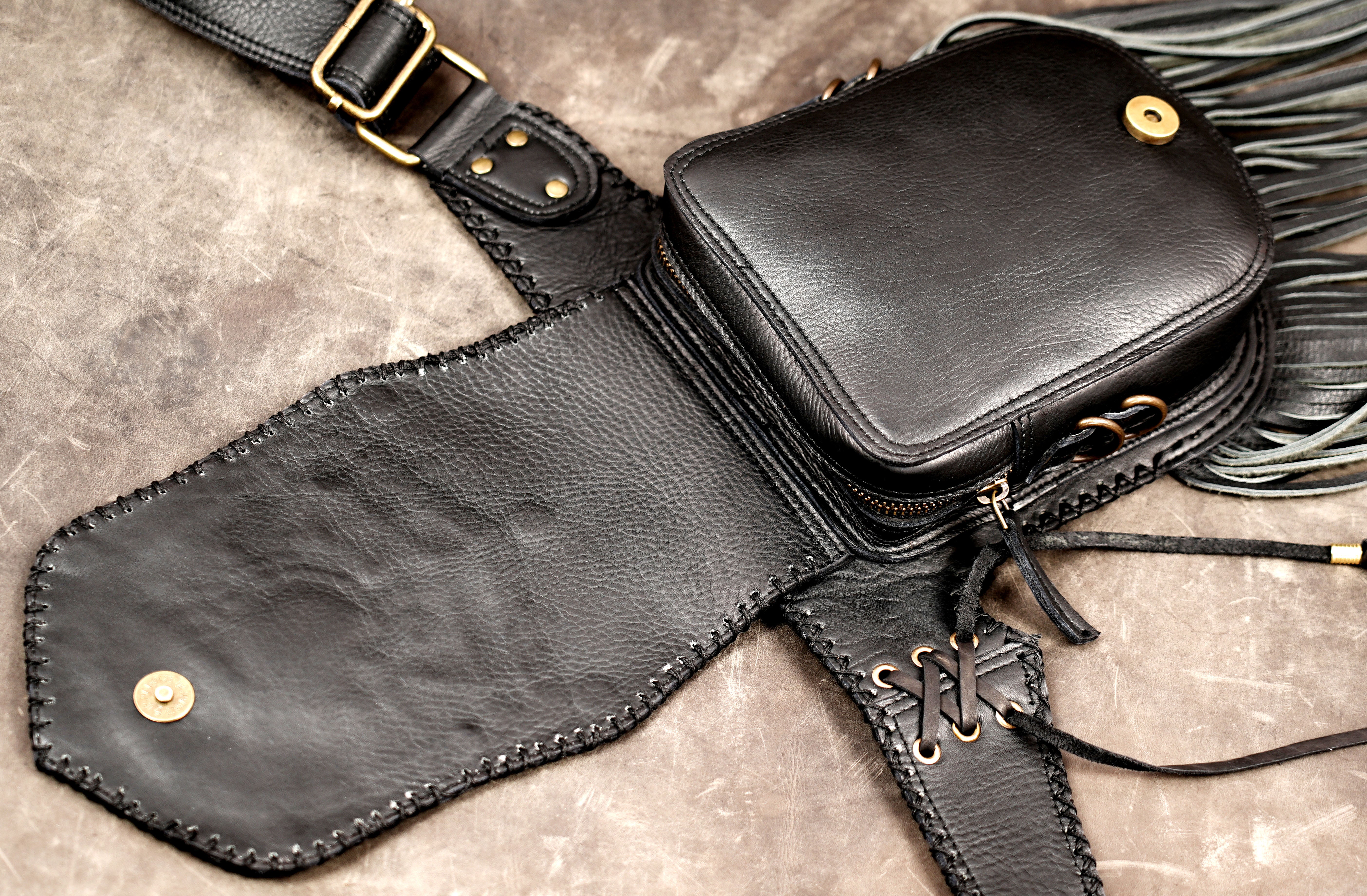Bohemian leather hip belt with detailed stitching