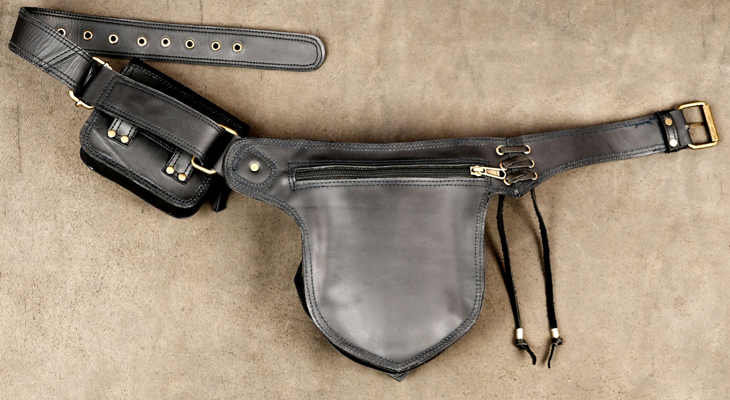 Black leather utility hip belt with adjustable buckle