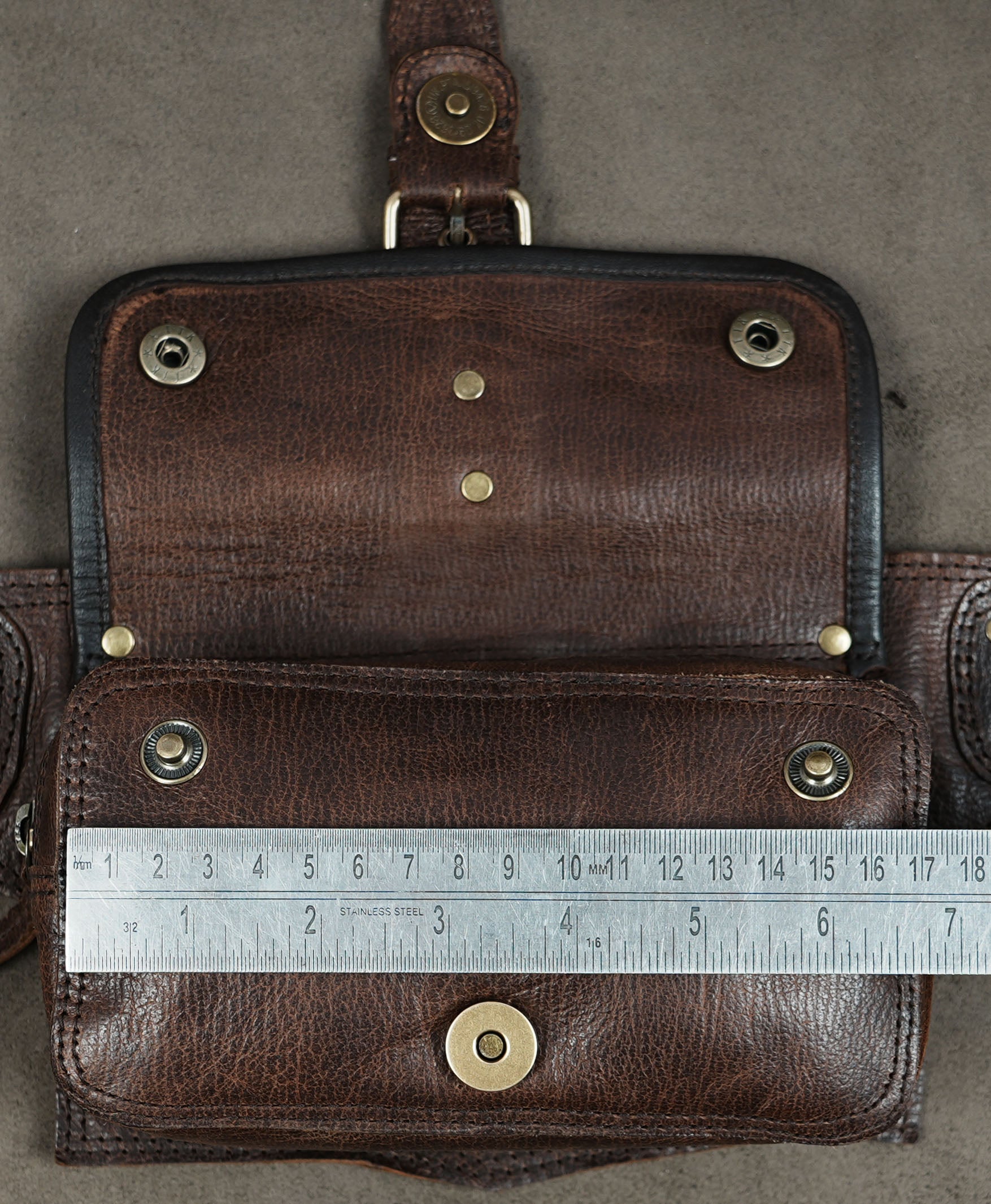 Genuine leather hip bag with secure buckle flap pockets