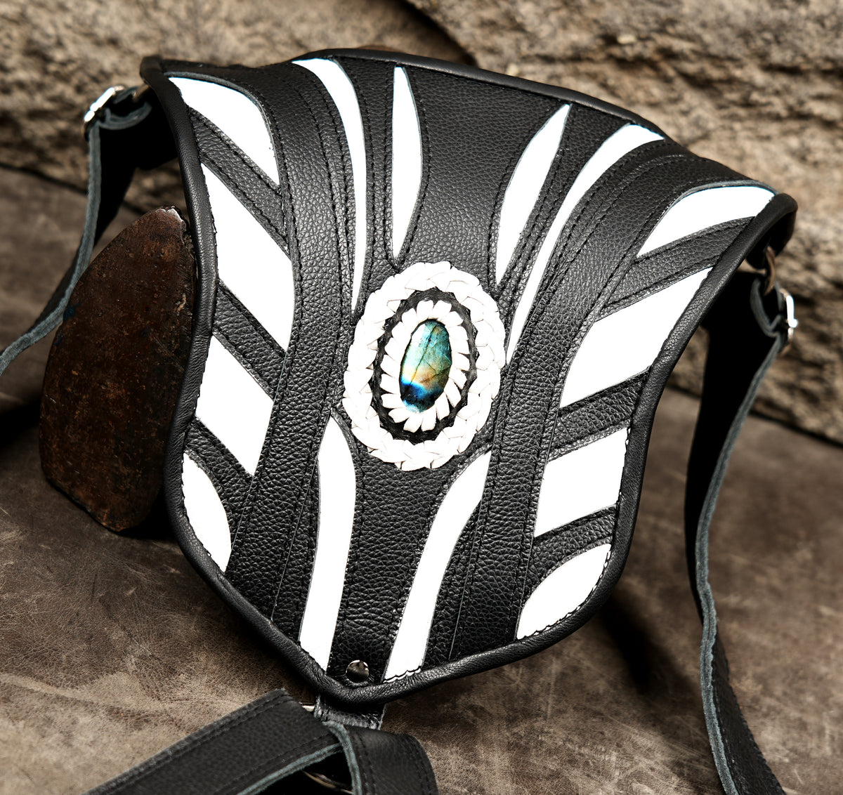 Handmade leather harness bag decorated with labradorite stones