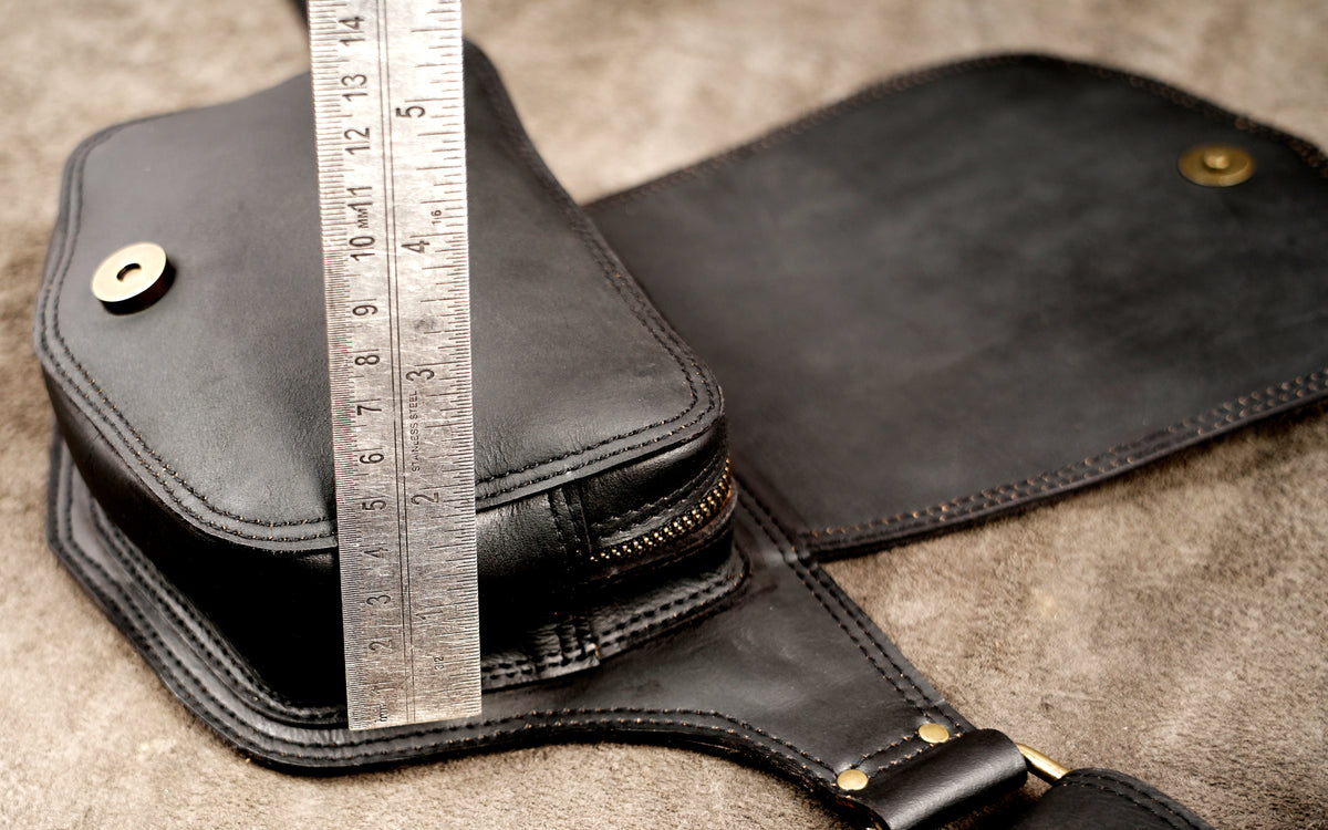 Black leather utility belt with pouches   