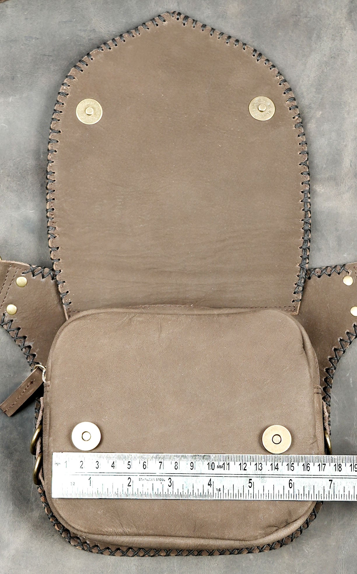 Brown suede-look leather hip bag with stone centerpiece