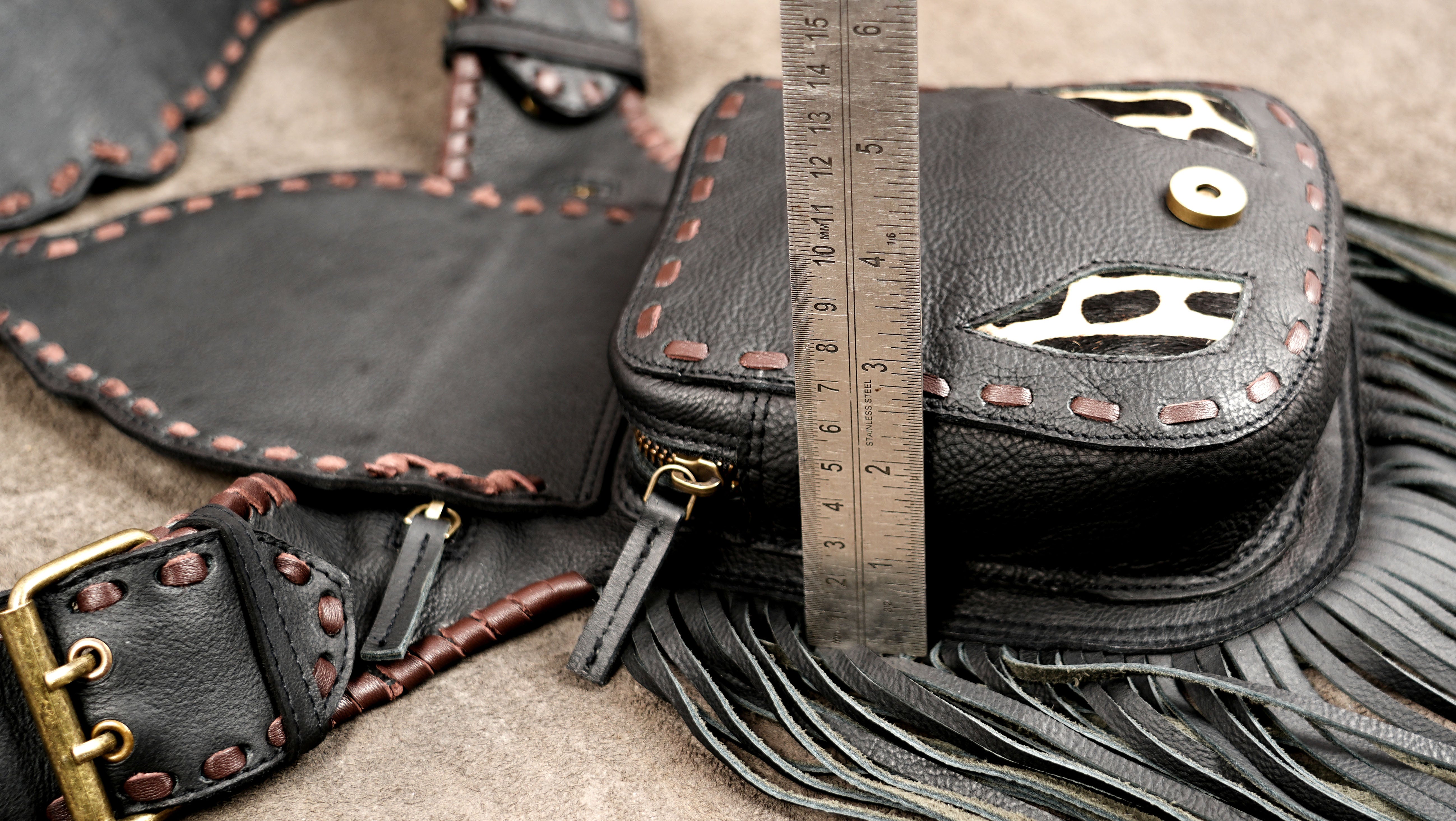Black Leather Fringe Waist Belt Bag with Cow Print Detail and Antique Brass Hardware