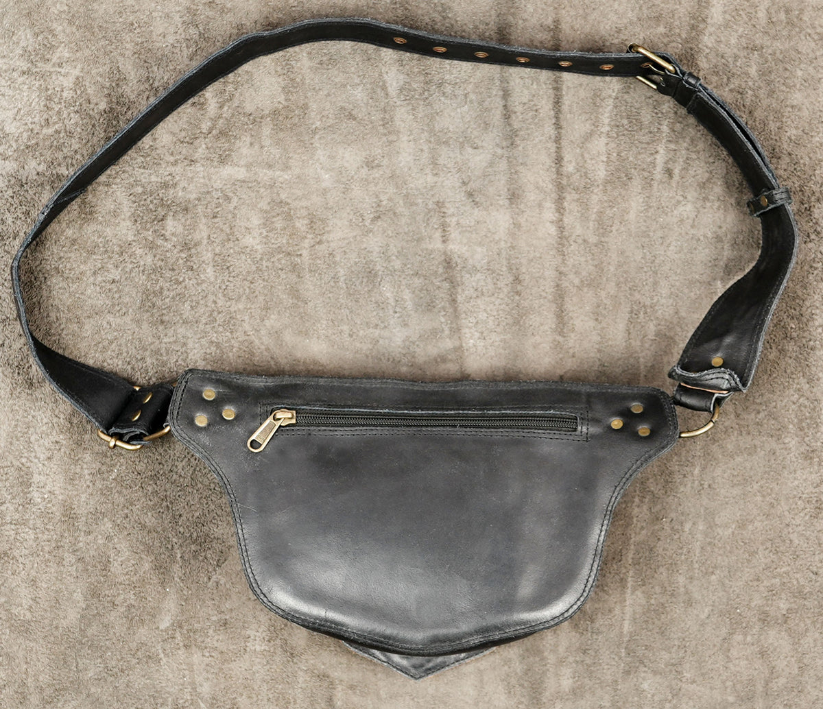 Festival ready leather waist bag with tribal stitch pattern