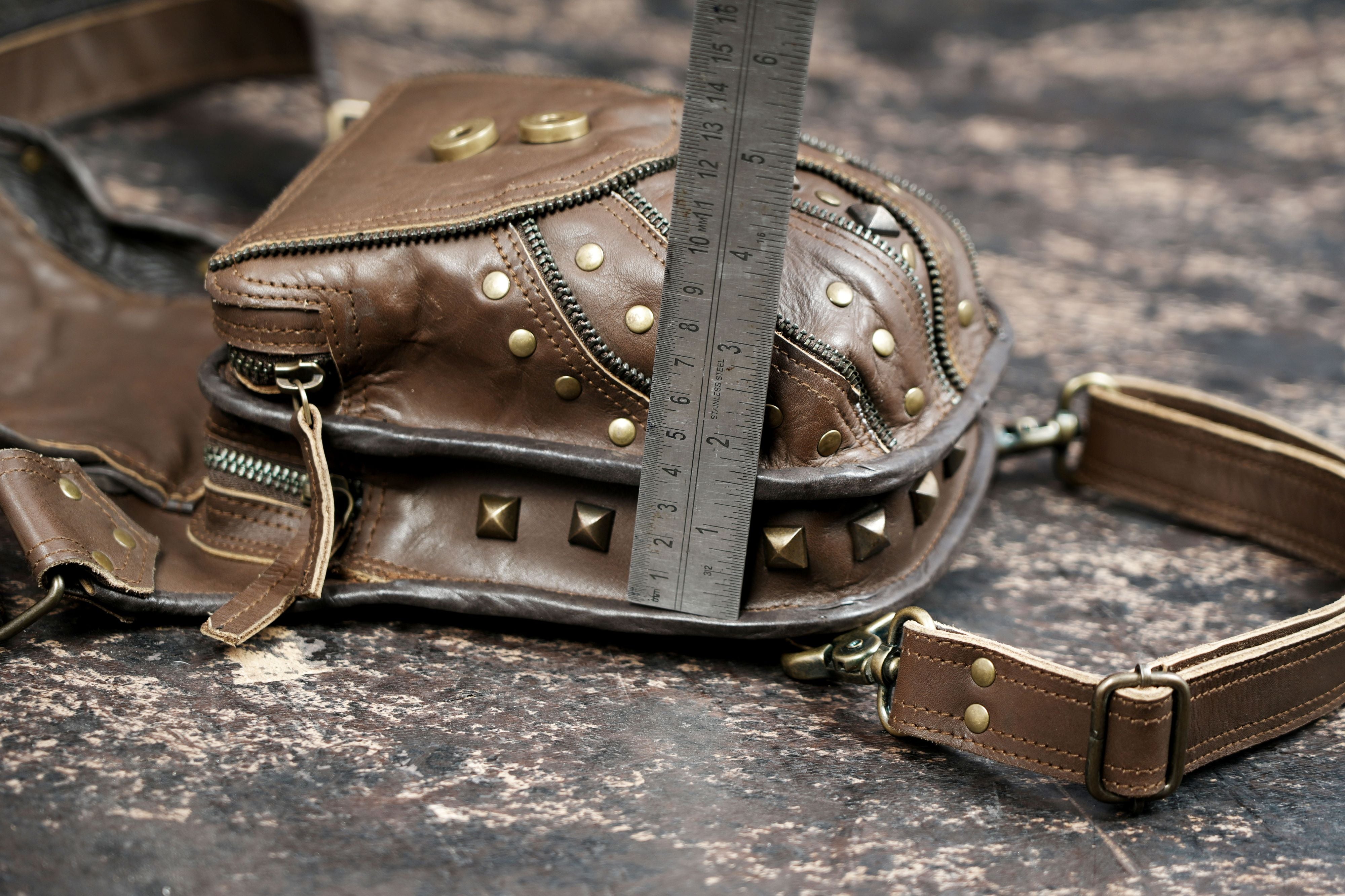 Brown leather waist thigh belt with adjustable buckle