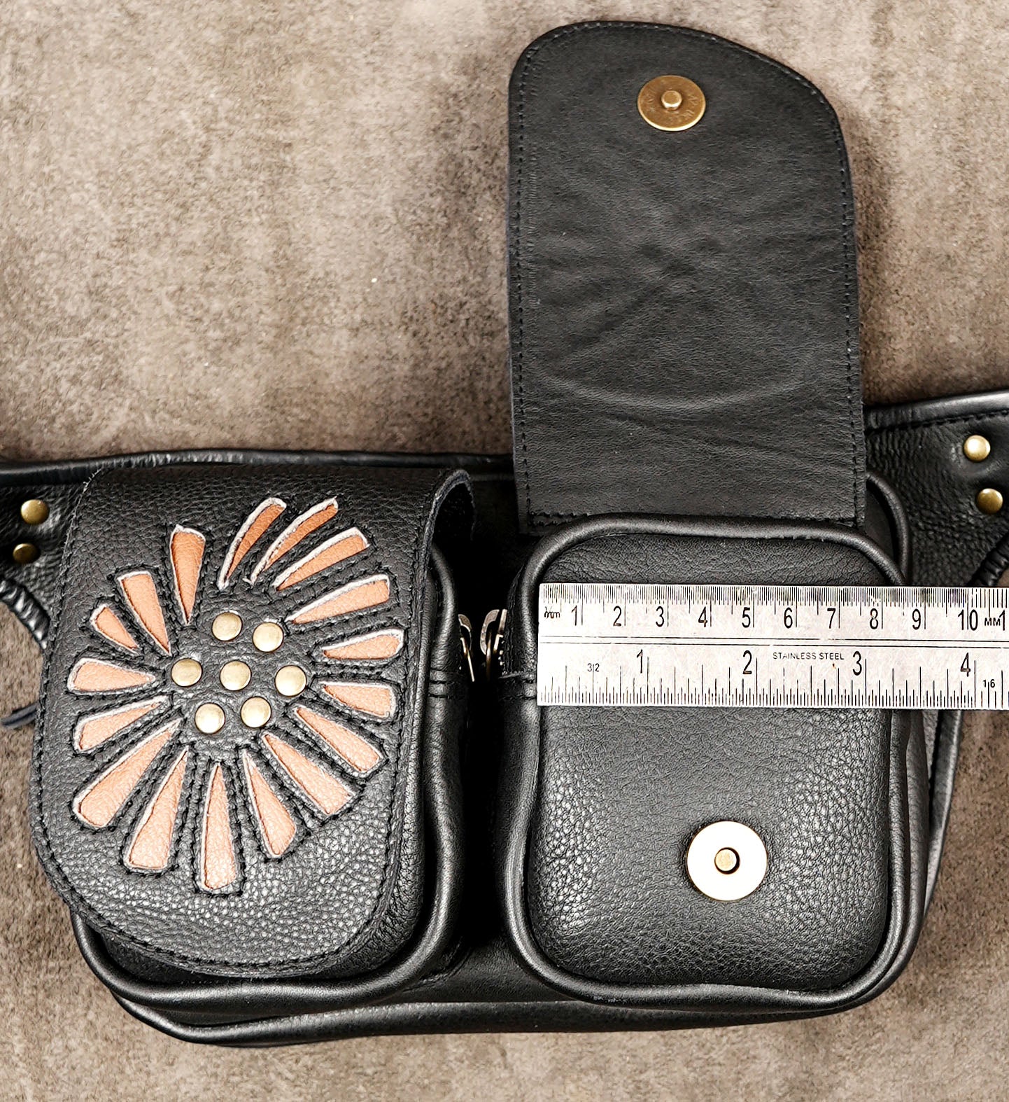 Floral double-pocket leather belt bag for concerts, festivals, and outdoor events.