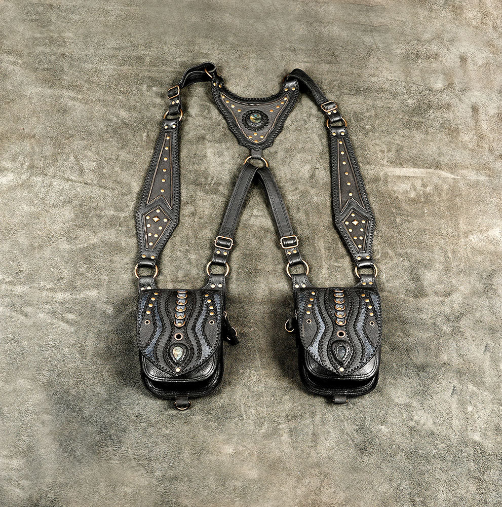 Handmade bohemian leather body harness and dual pocket holster bag styled for festival fashion and alternative streetwear